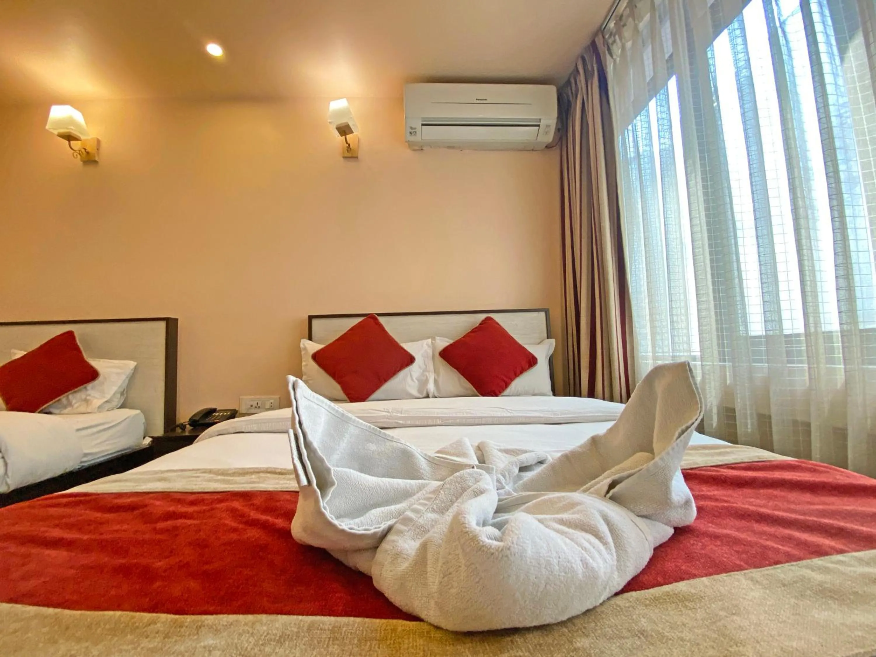 Bed in Hotel Readers Inn Pvt.Ltd