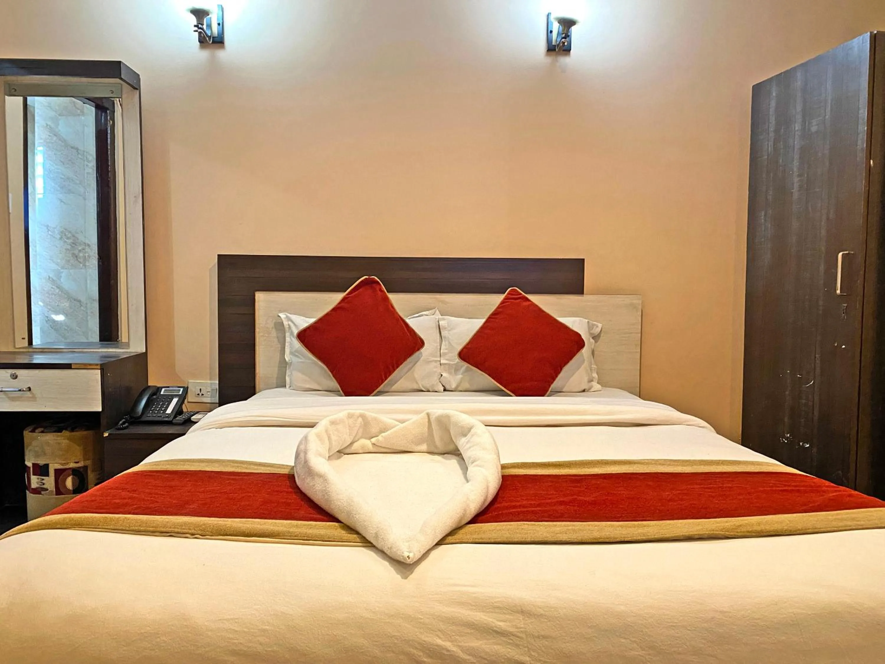 Bedroom in Hotel Readers Inn Pvt.Ltd