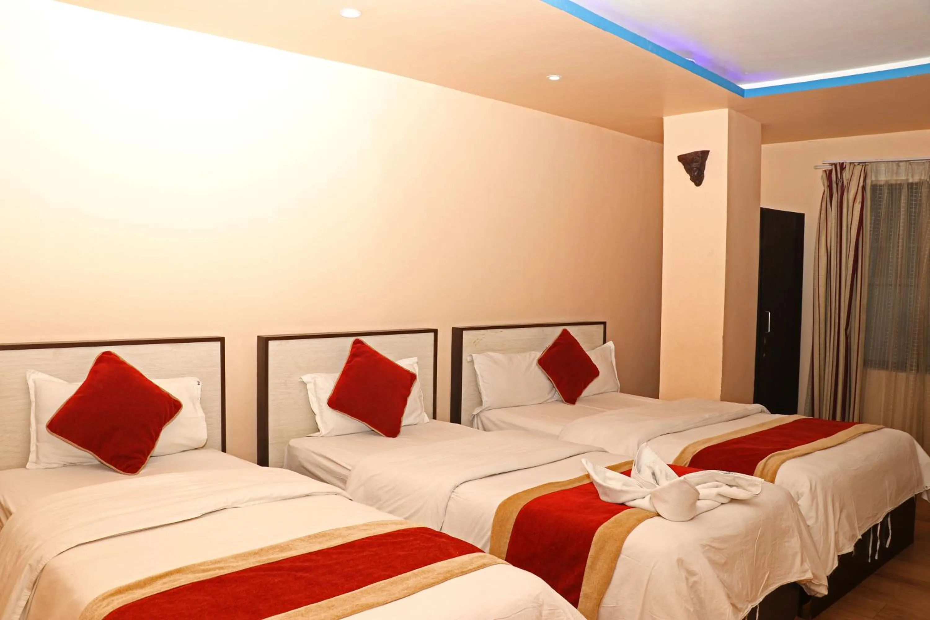 Bed in Hotel Readers Inn Pvt.Ltd