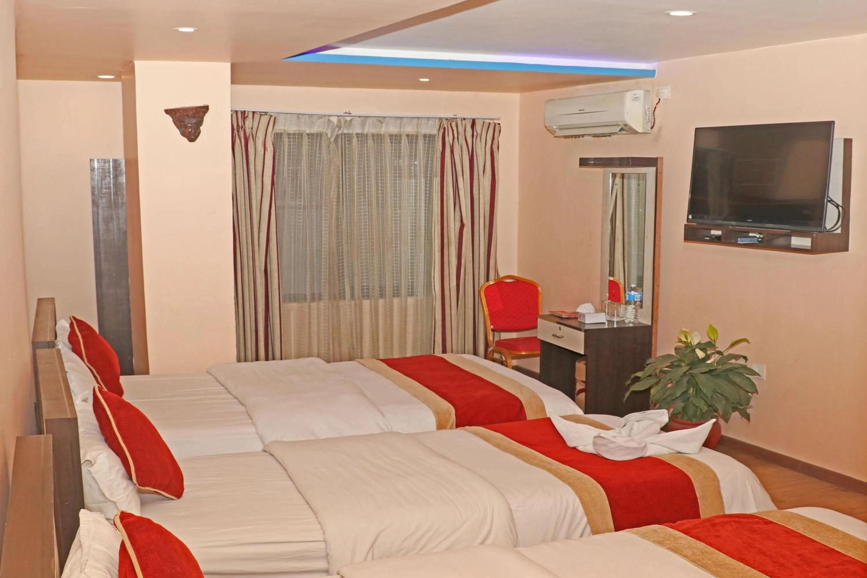 Bed in Hotel Readers Inn Pvt.Ltd