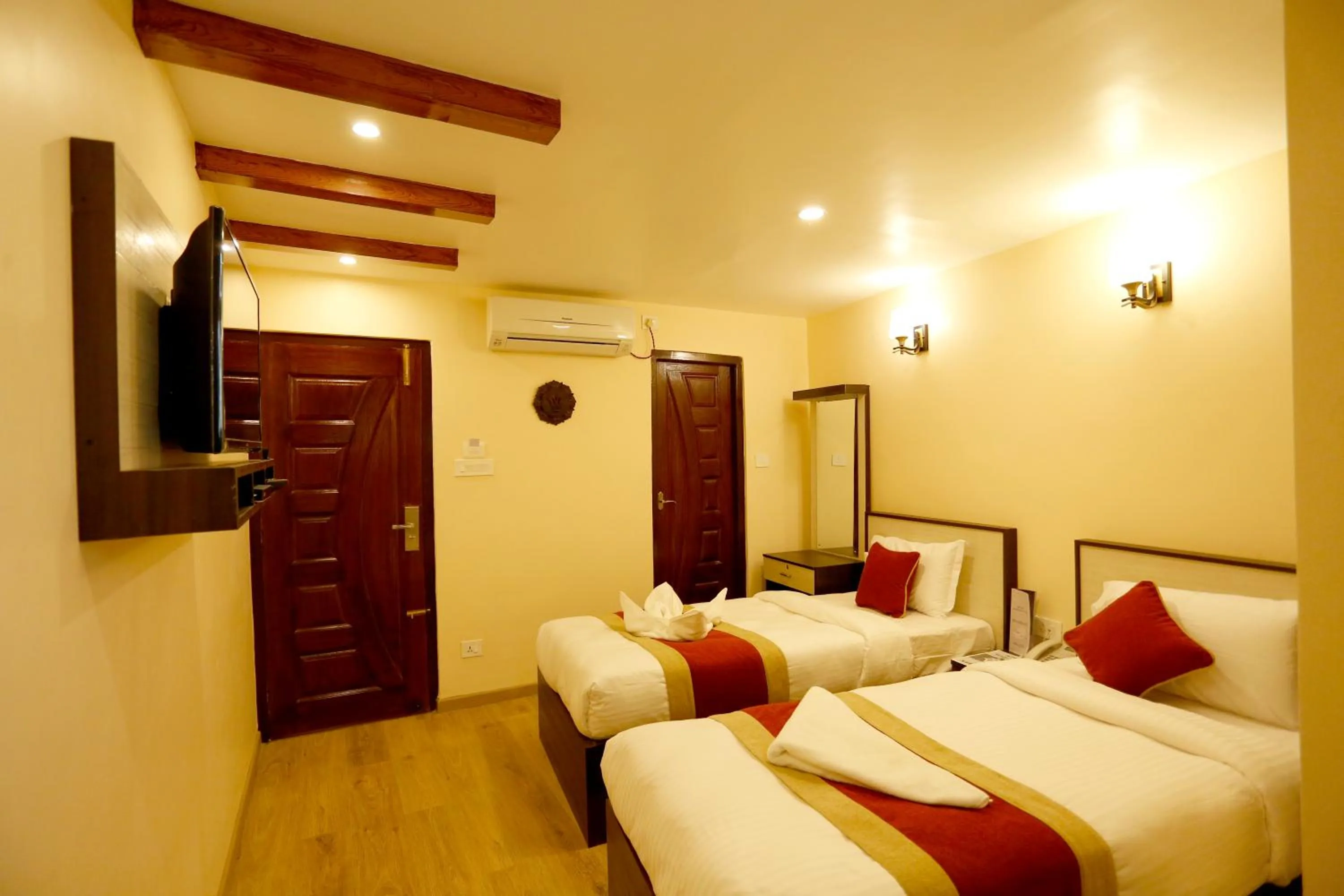 Bed in Hotel Readers Inn Pvt.Ltd