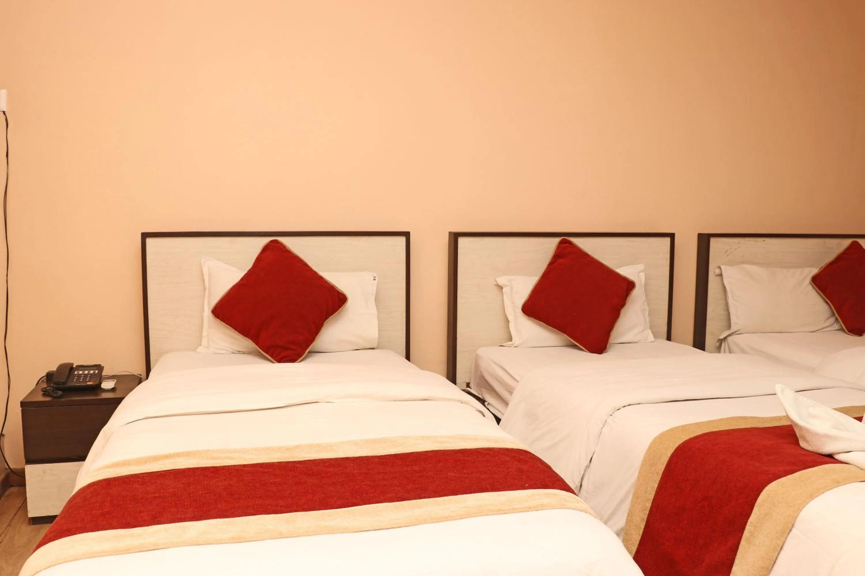 Bed in Hotel Readers Inn Pvt.Ltd