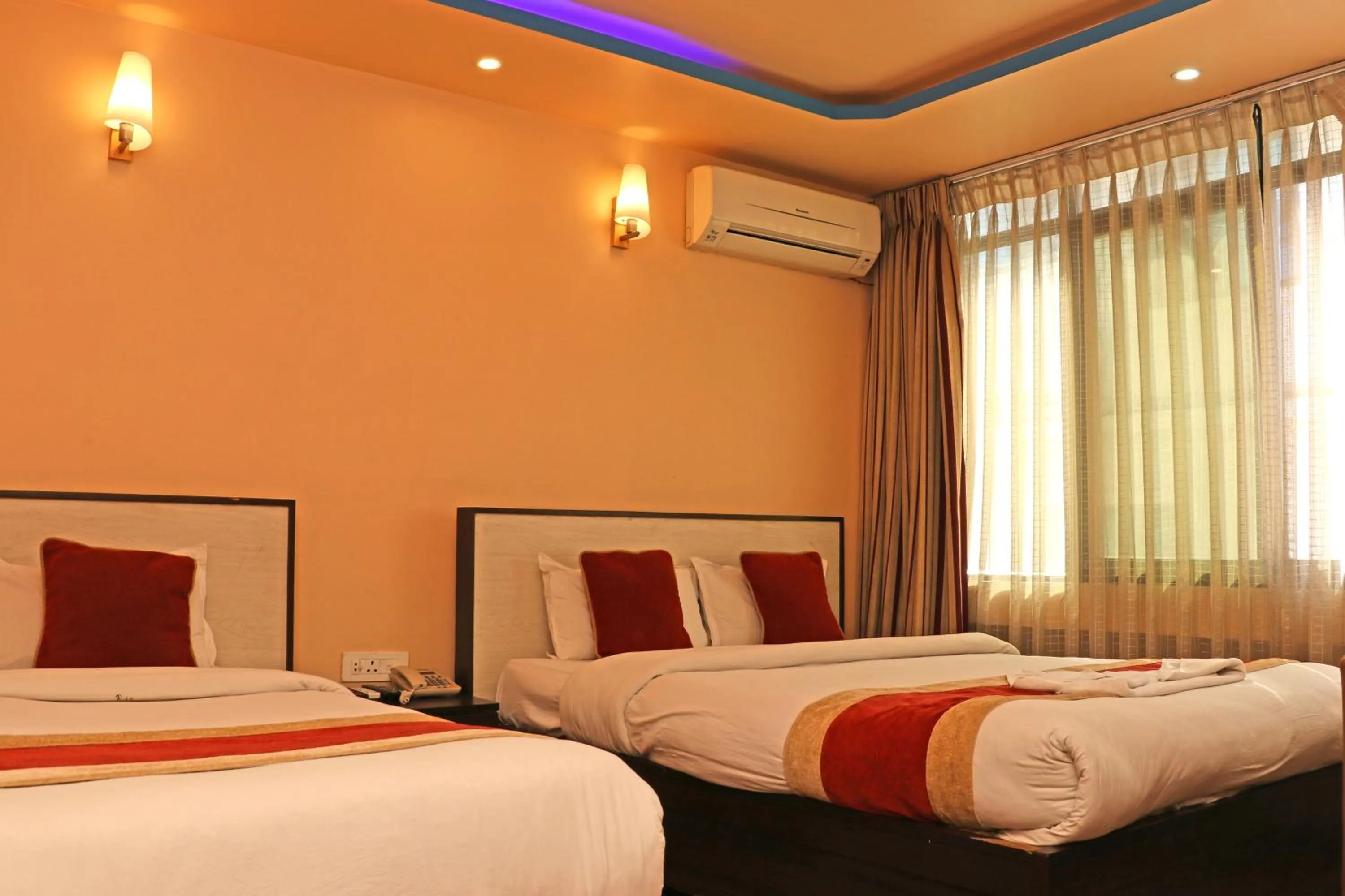 Bed in Hotel Readers Inn Pvt.Ltd