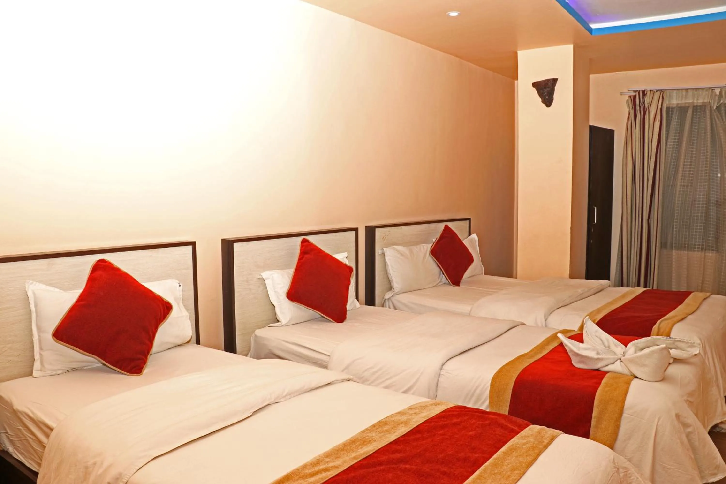 Bed in Hotel Readers Inn Pvt.Ltd