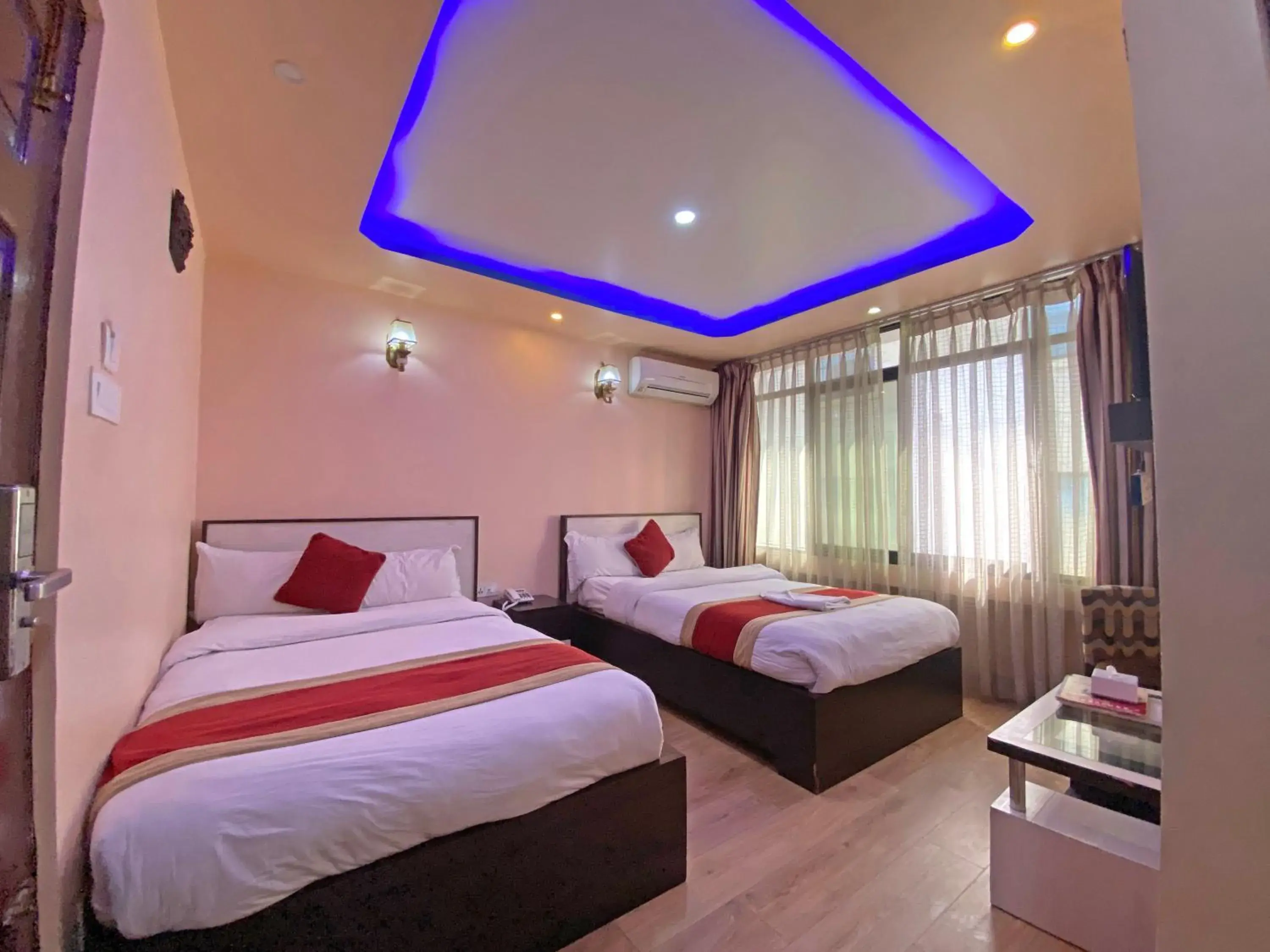 Deluxe Quadruple Room in Hotel Readers Inn Pvt.Ltd Deluxe Quadruple Room in Hotel Readers Inn Pvt.Ltd