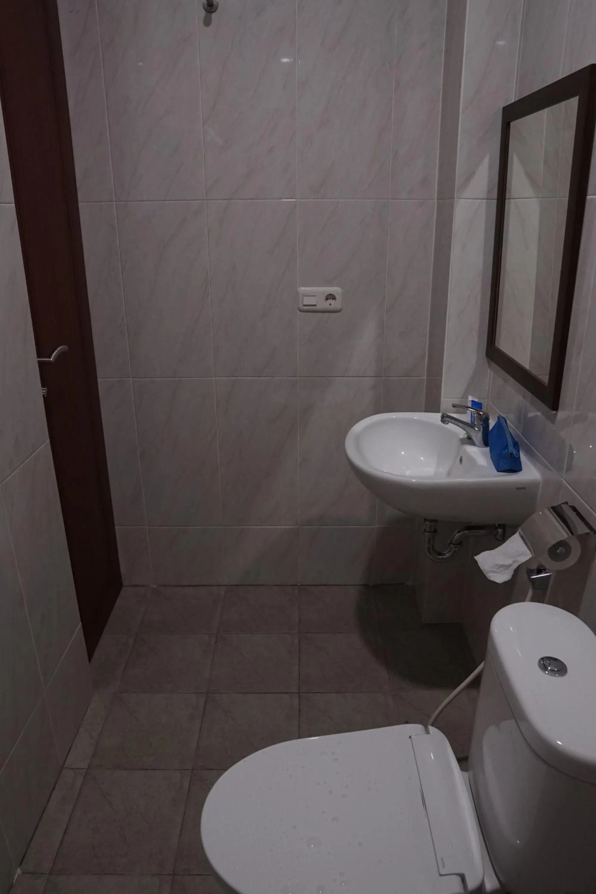 Bathroom in Cemerlang Inn