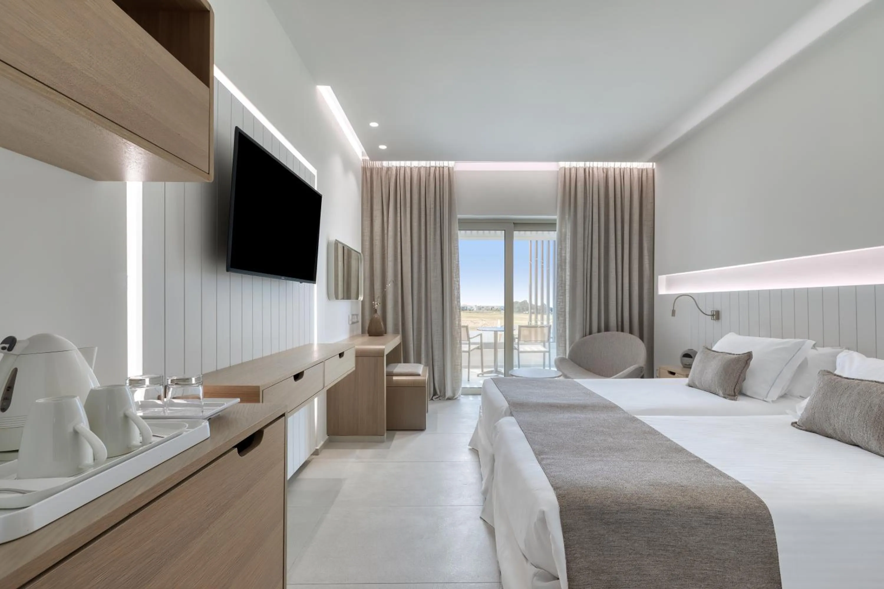 Bed in Neptune Luxury Resort