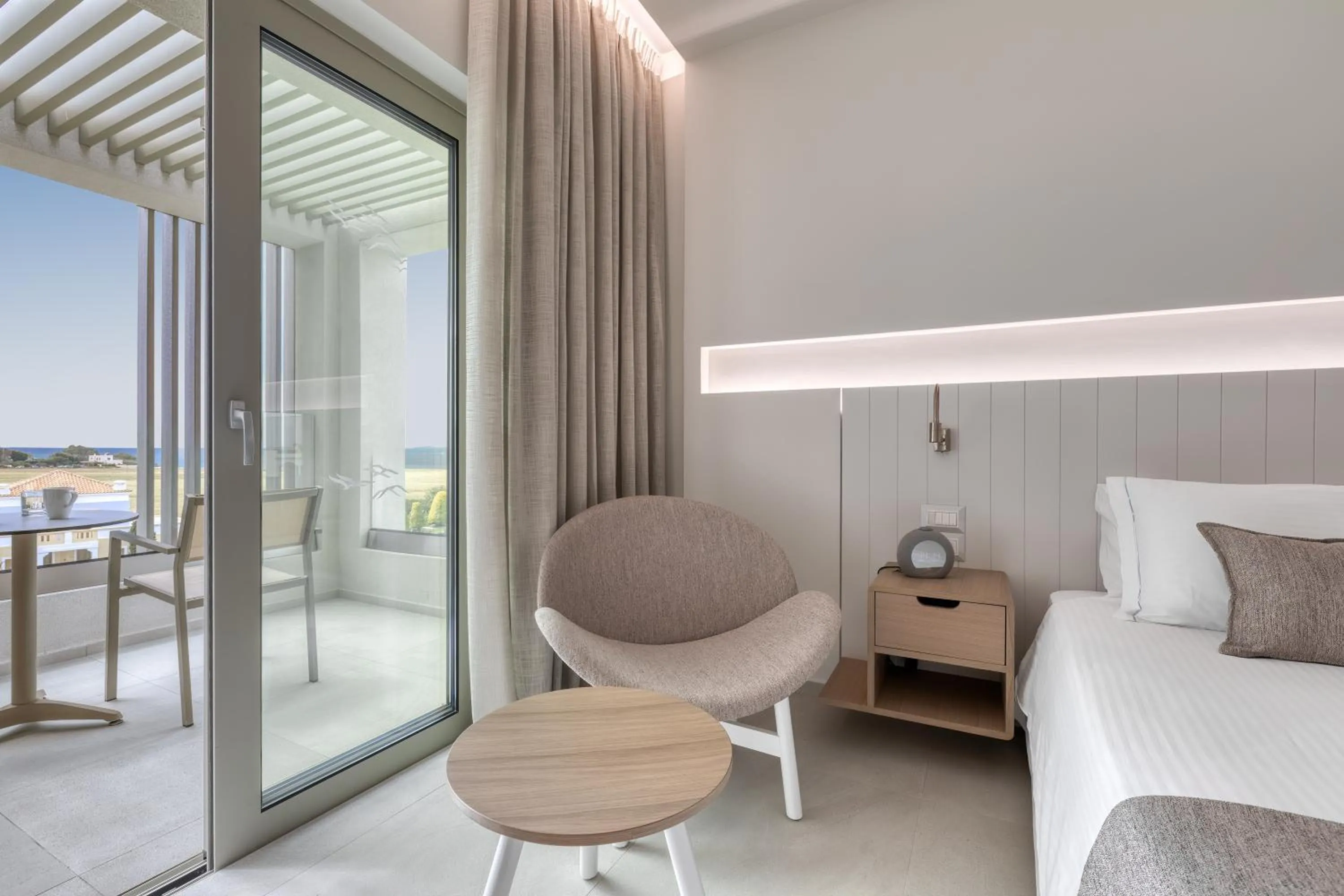 Bed in Neptune Luxury Resort