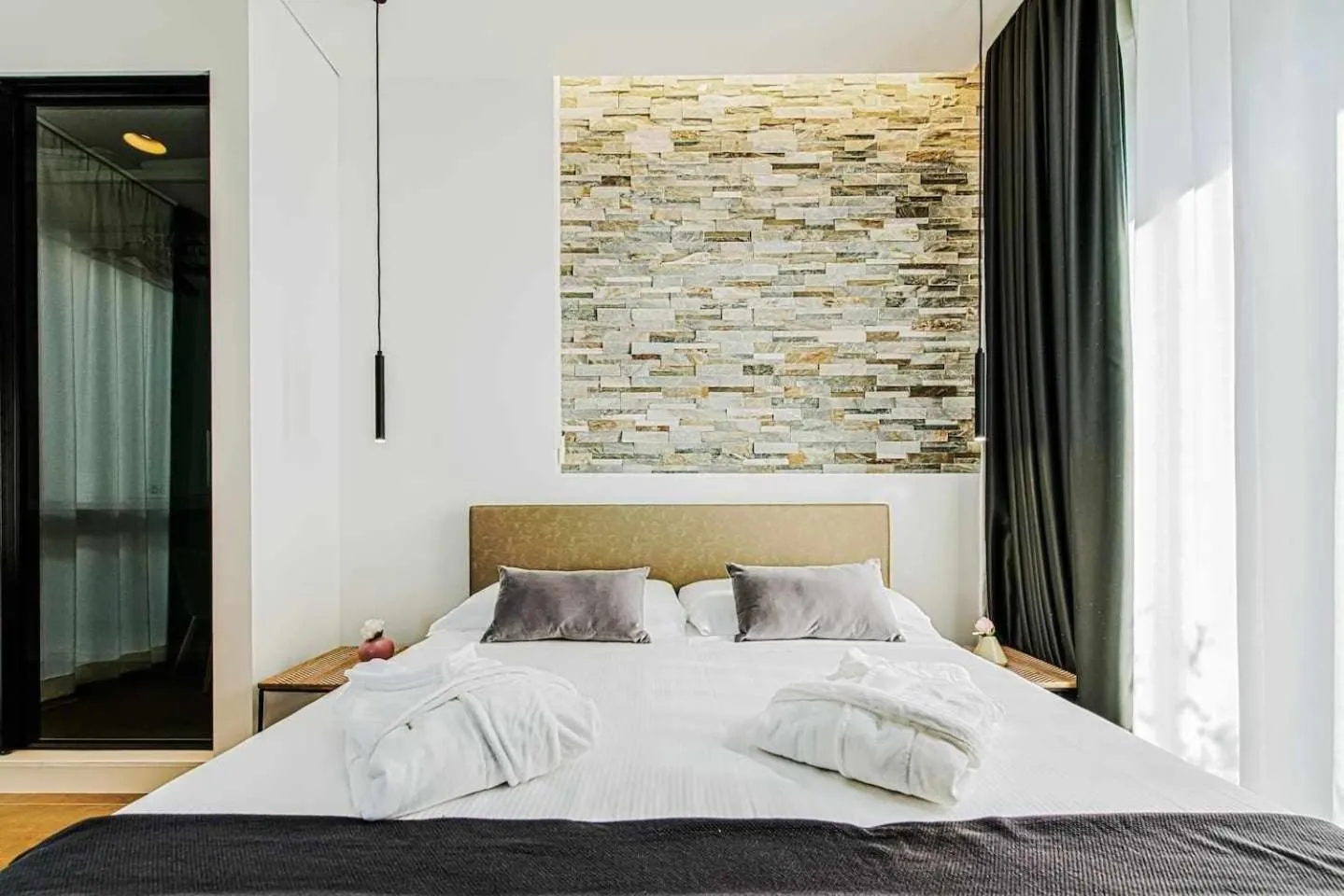 Bed in Acquarella Resort Suite