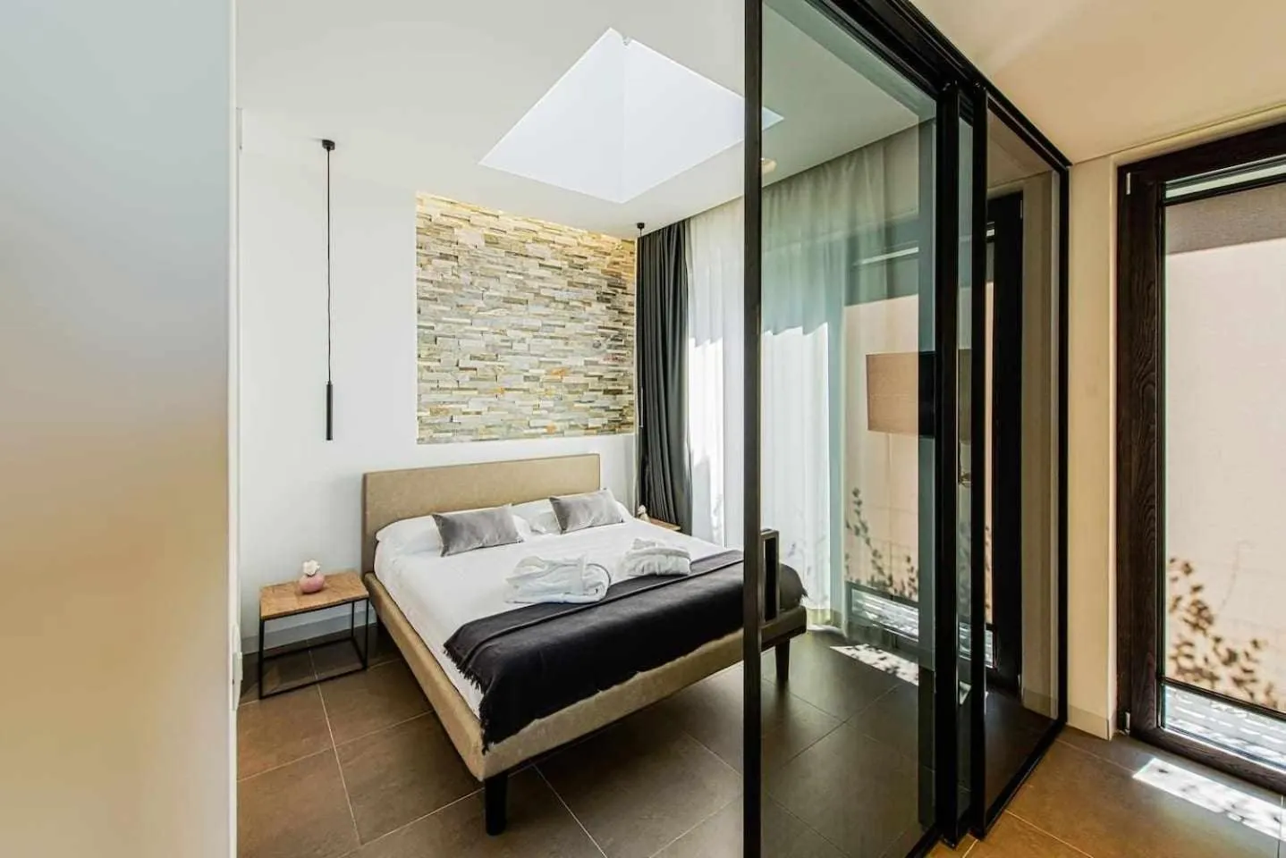 Bed in Acquarella Resort Suite