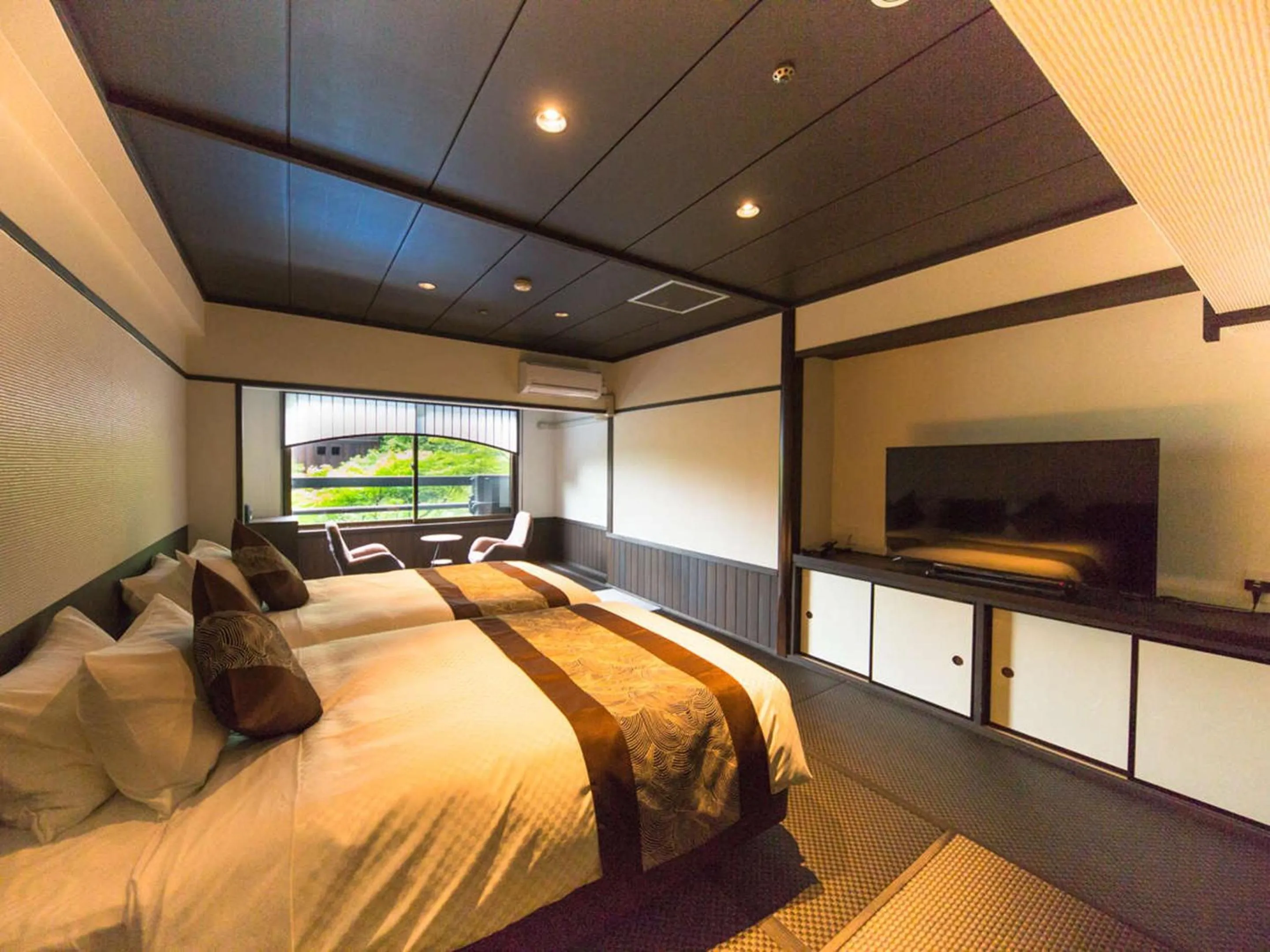 Bed in LiVEMAX RESORT Aki Miyajima