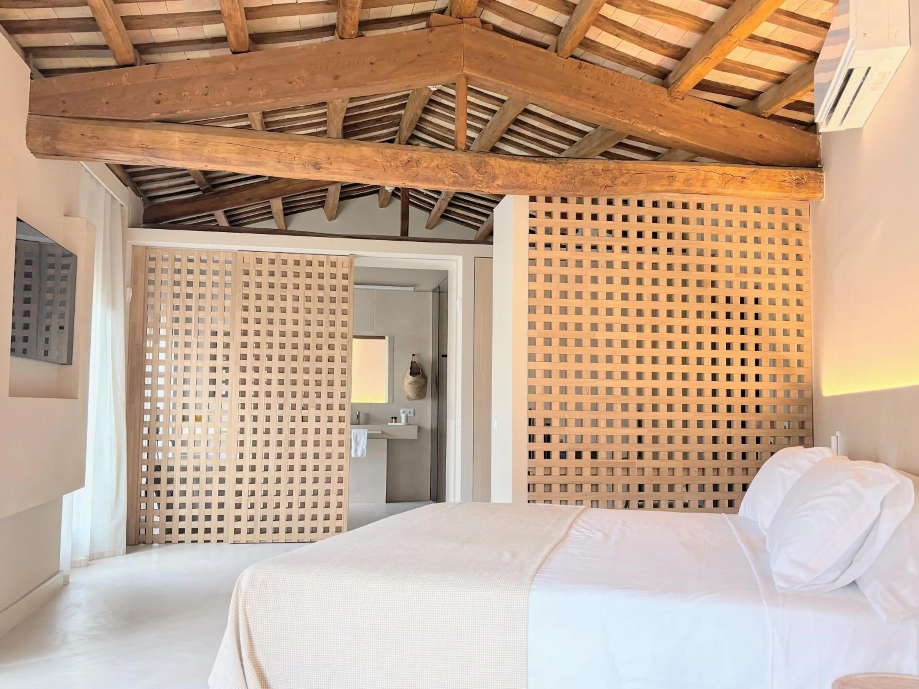 Bed in Les Clarisses Boutique Hotel