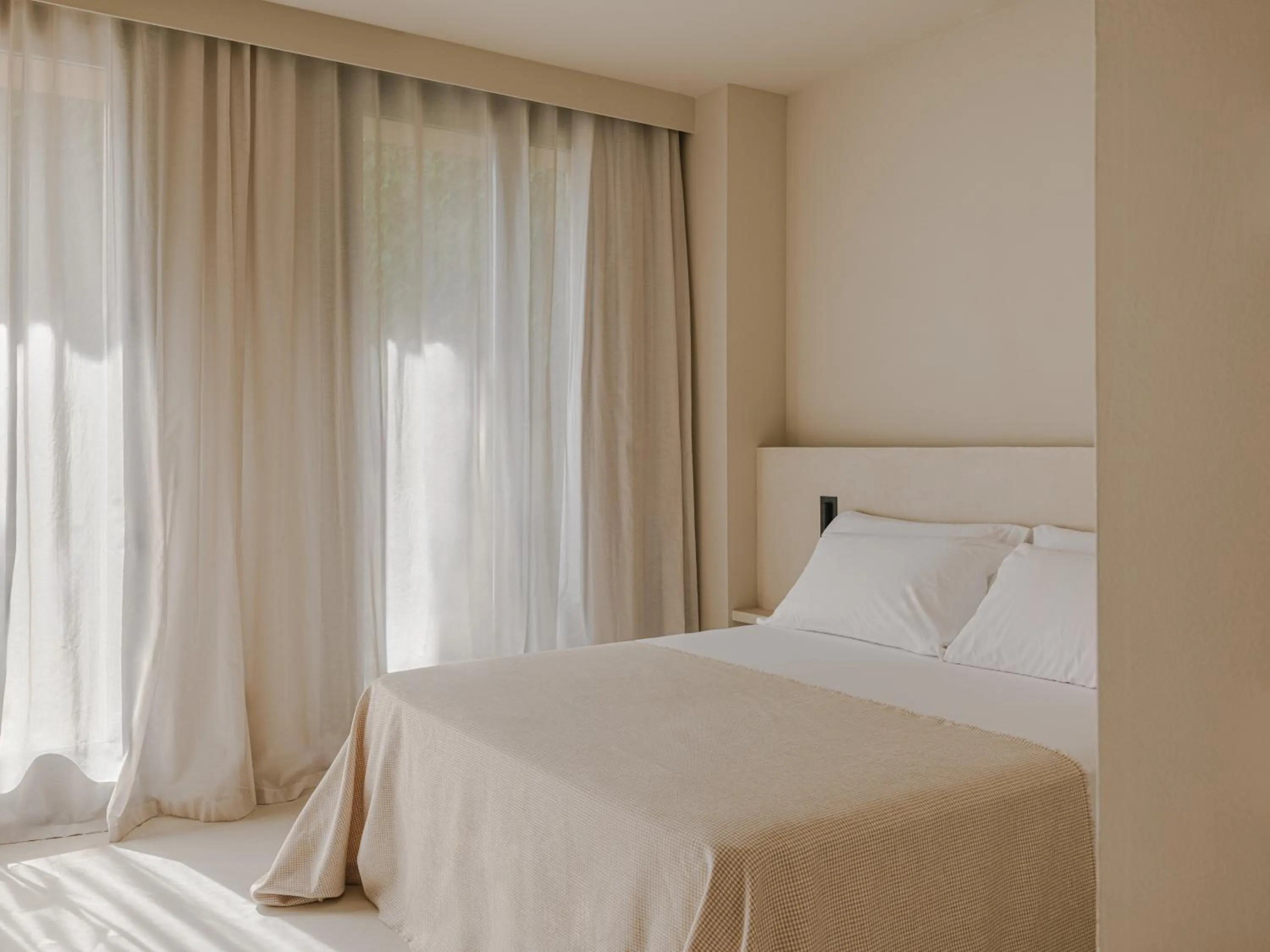 Bed in Les Clarisses Boutique Hotel