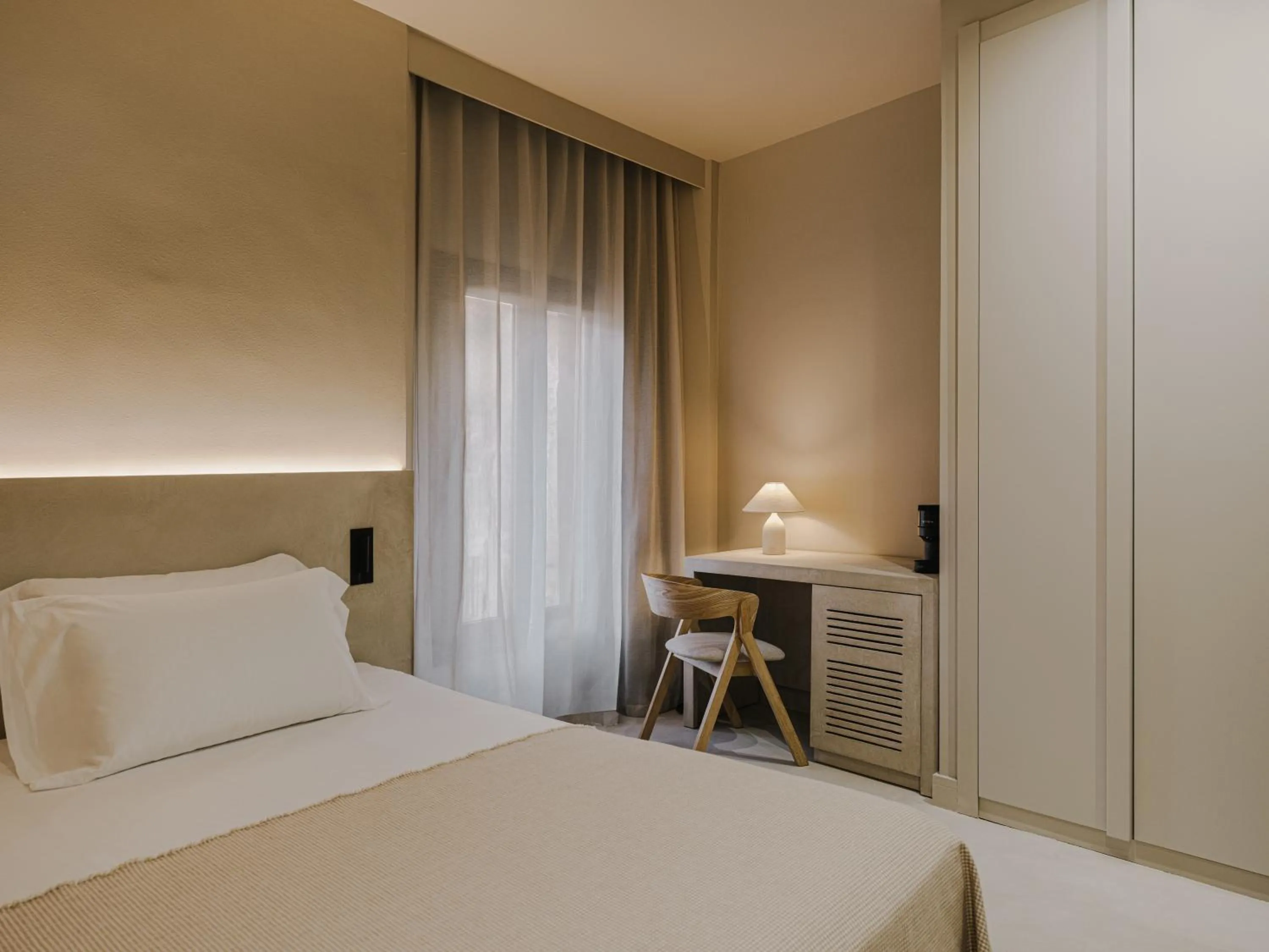 Bed in Les Clarisses Boutique Hotel