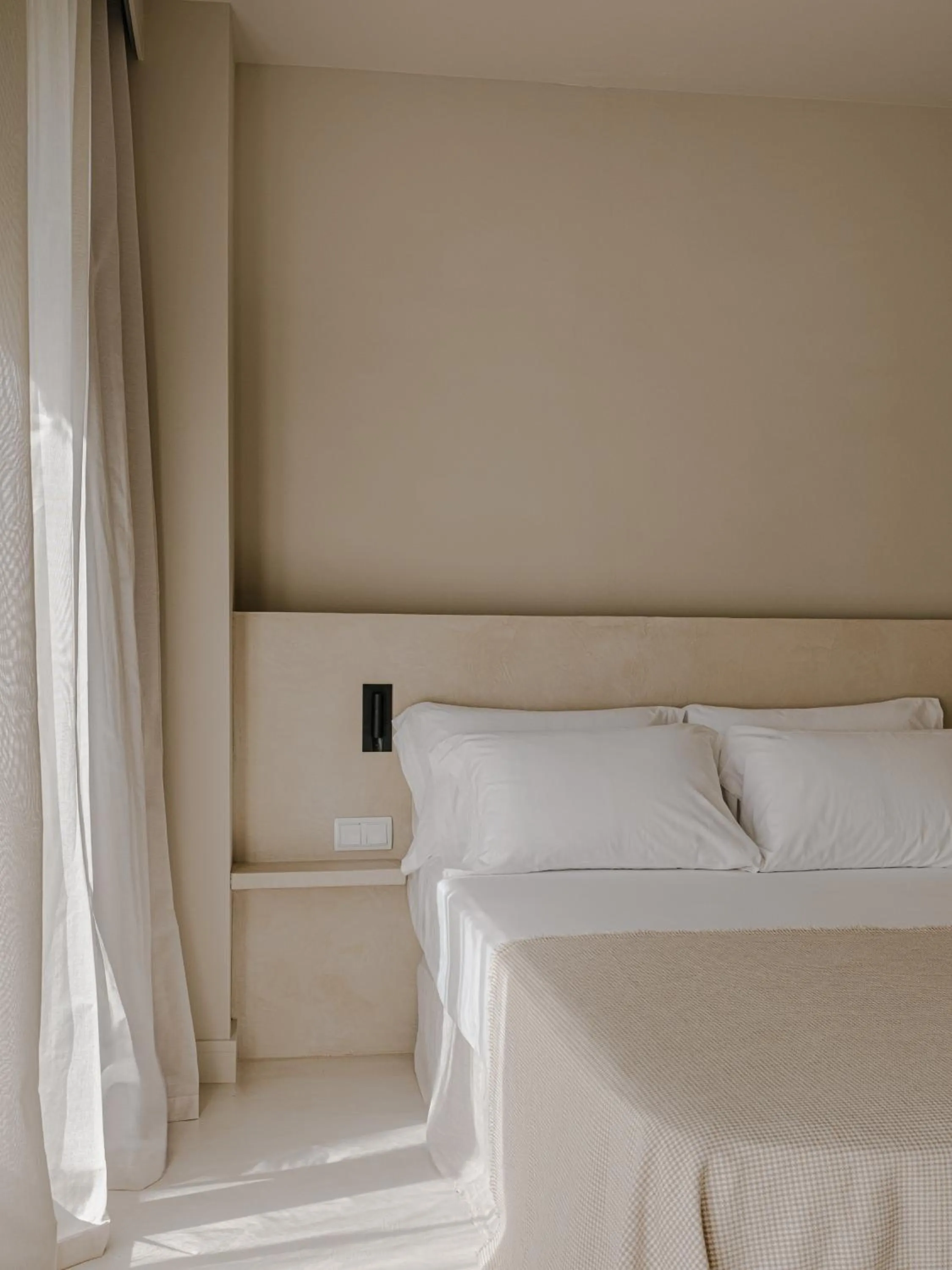 Bed in Les Clarisses Boutique Hotel
