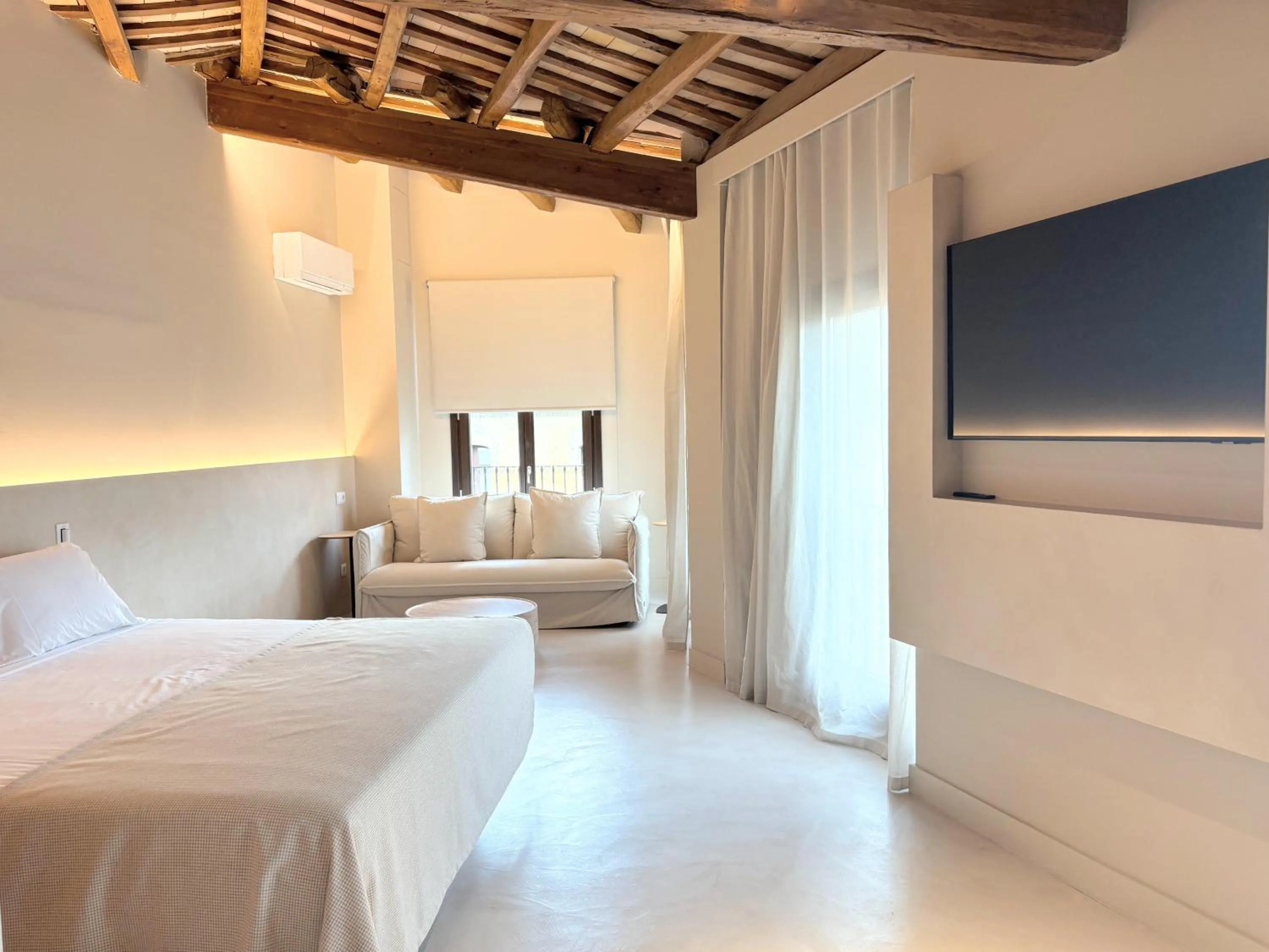 Bed in Les Clarisses Boutique Hotel