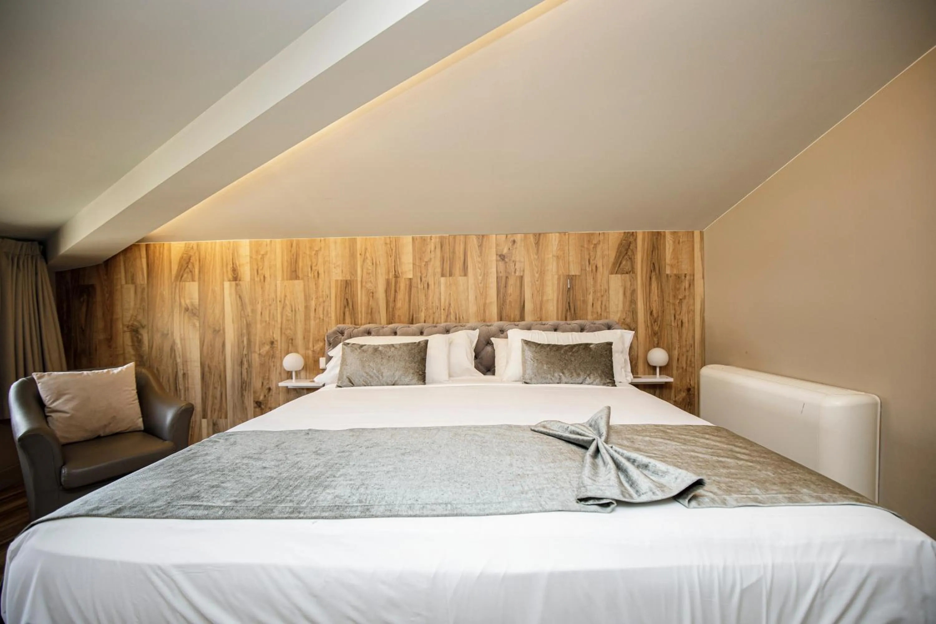 Bed in Les Clarisses Boutique Hotel