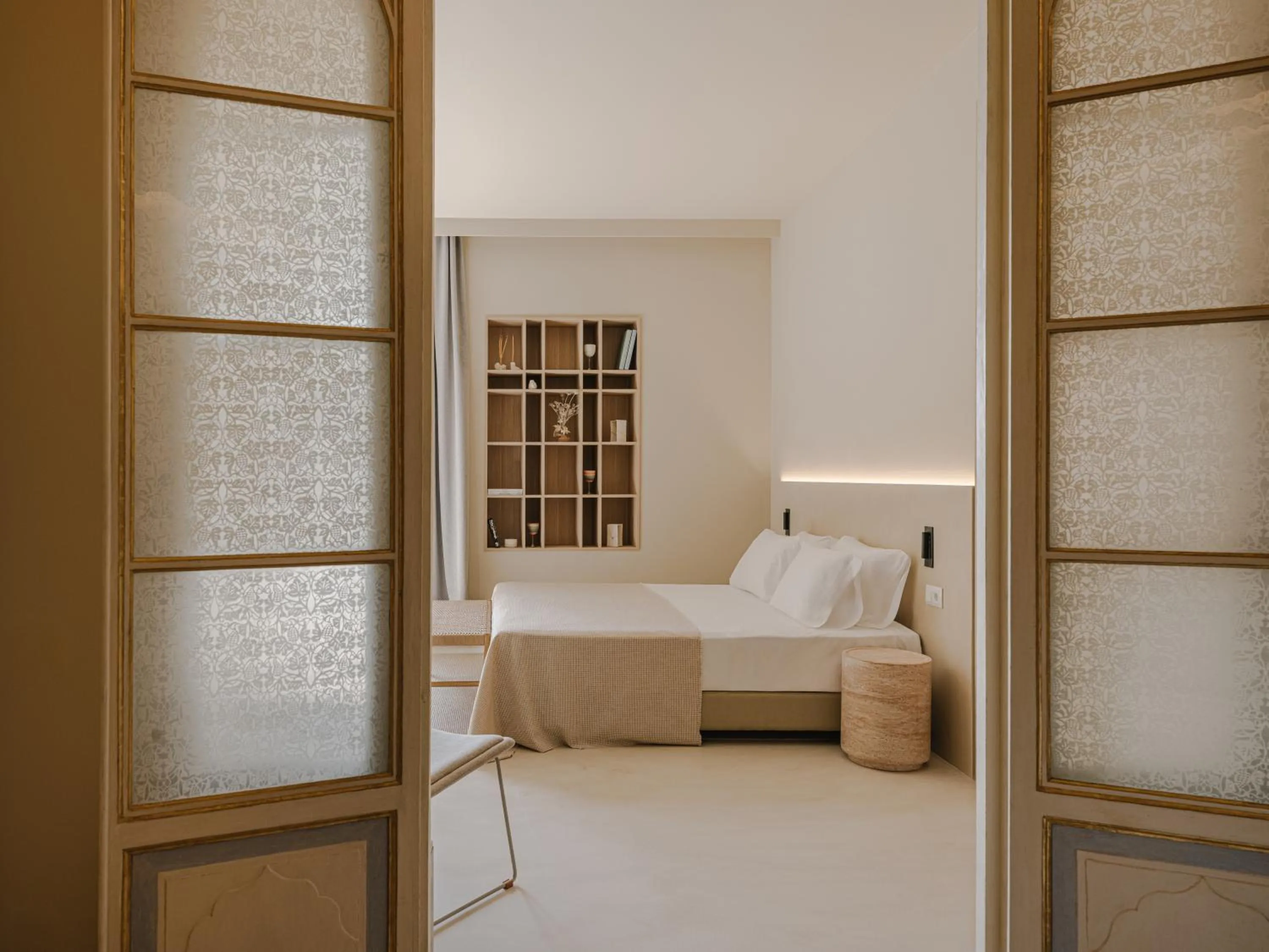 Bed in Les Clarisses Boutique Hotel