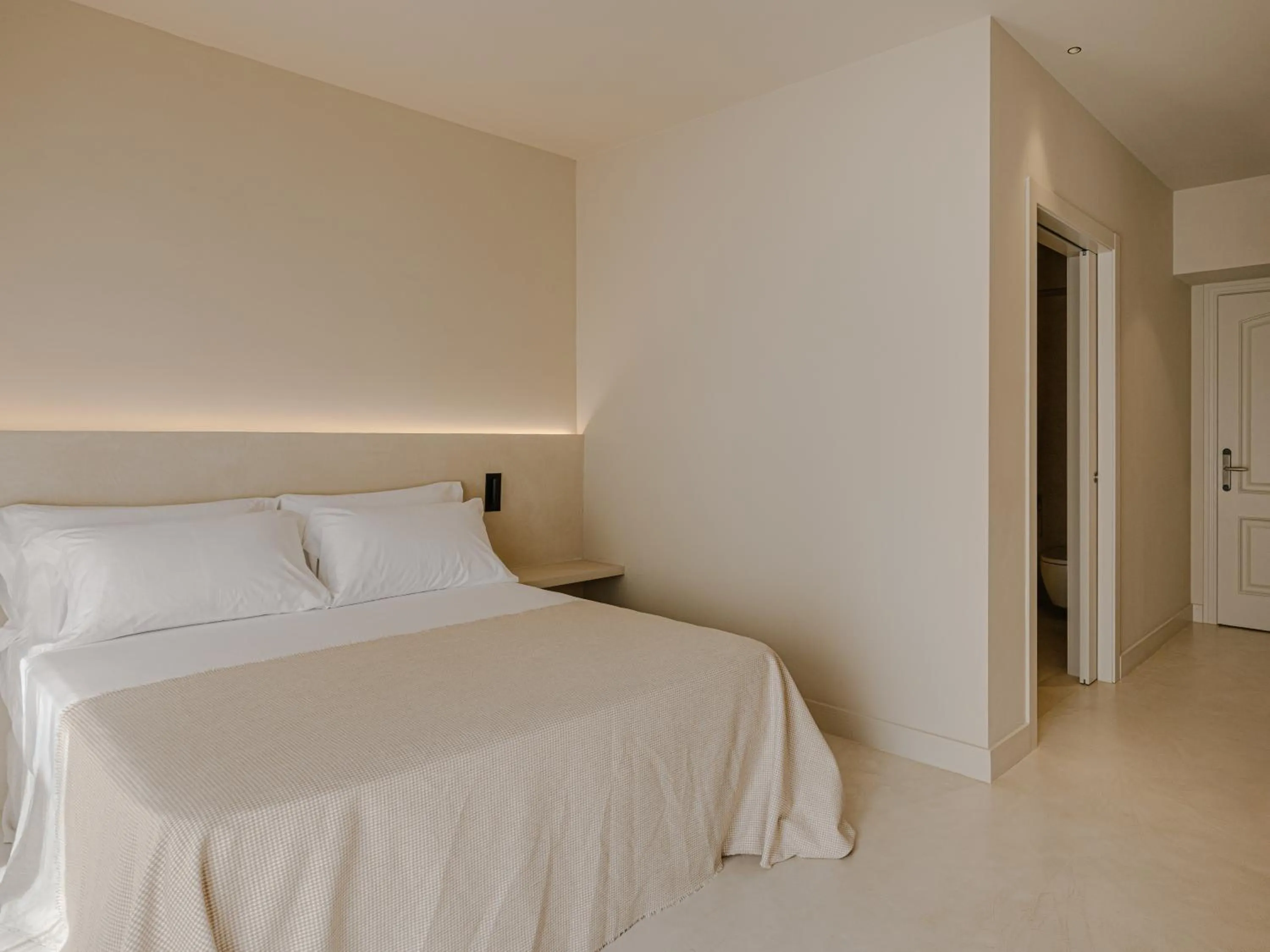 Bed in Les Clarisses Boutique Hotel