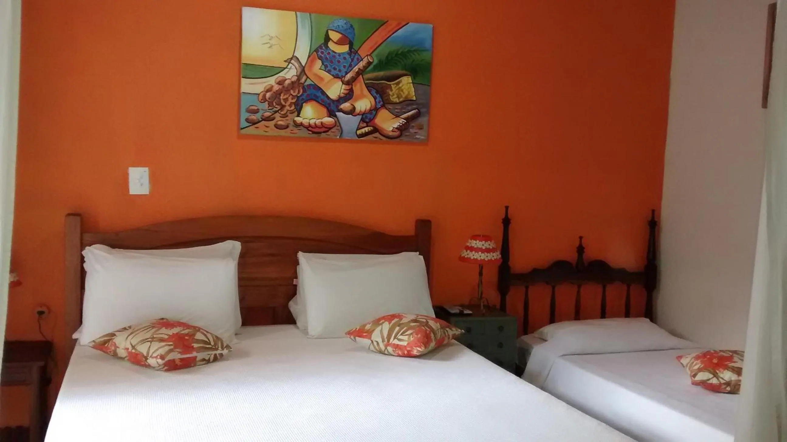 Photo of the whole room in Pousada Arte Colonial - Casarão Histórico do Séc XVIII - Lancha Própria