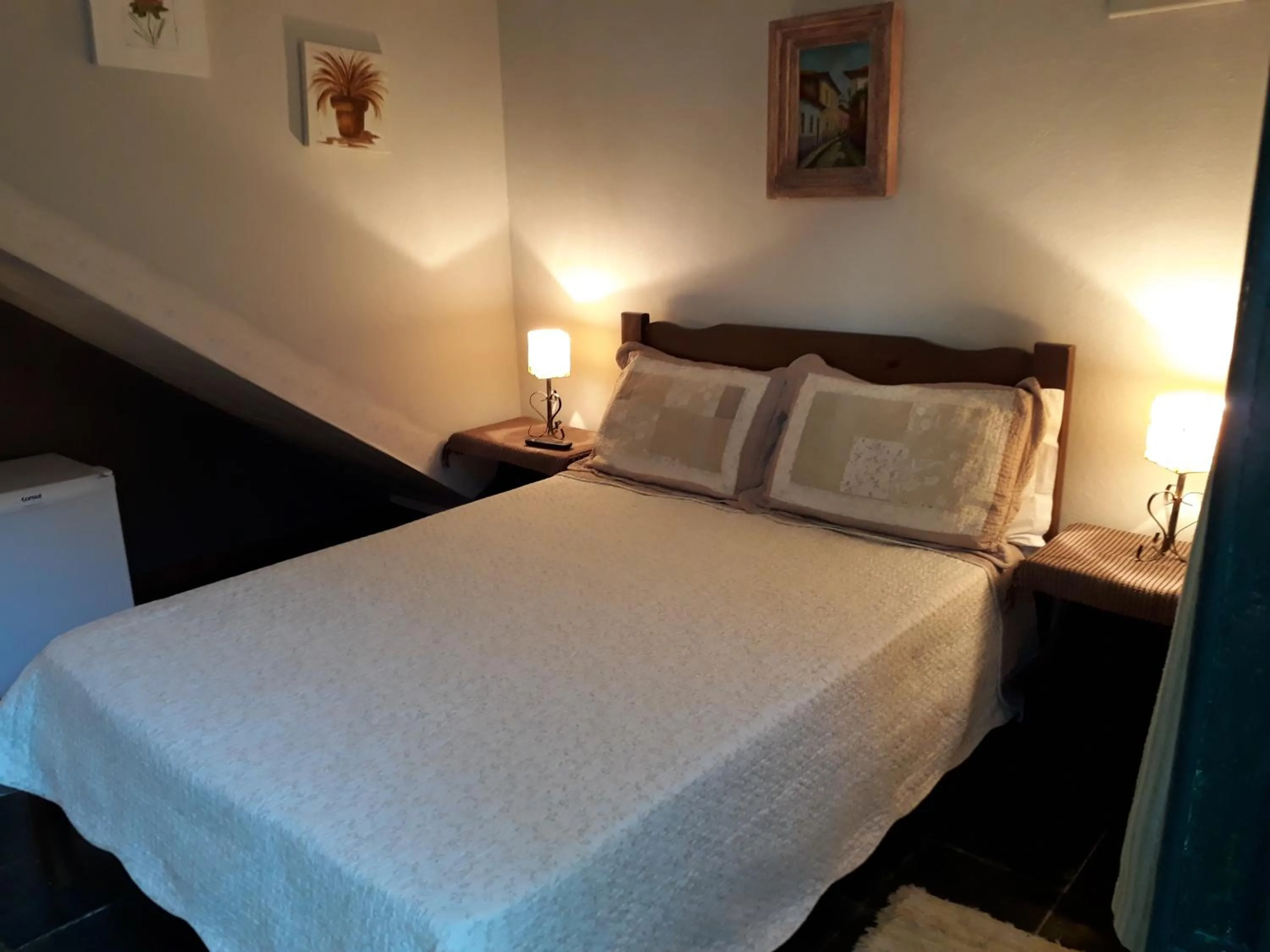 Bed in Pousada Arte Colonial - Casarão Histórico do Séc XVIII - Lancha Própria