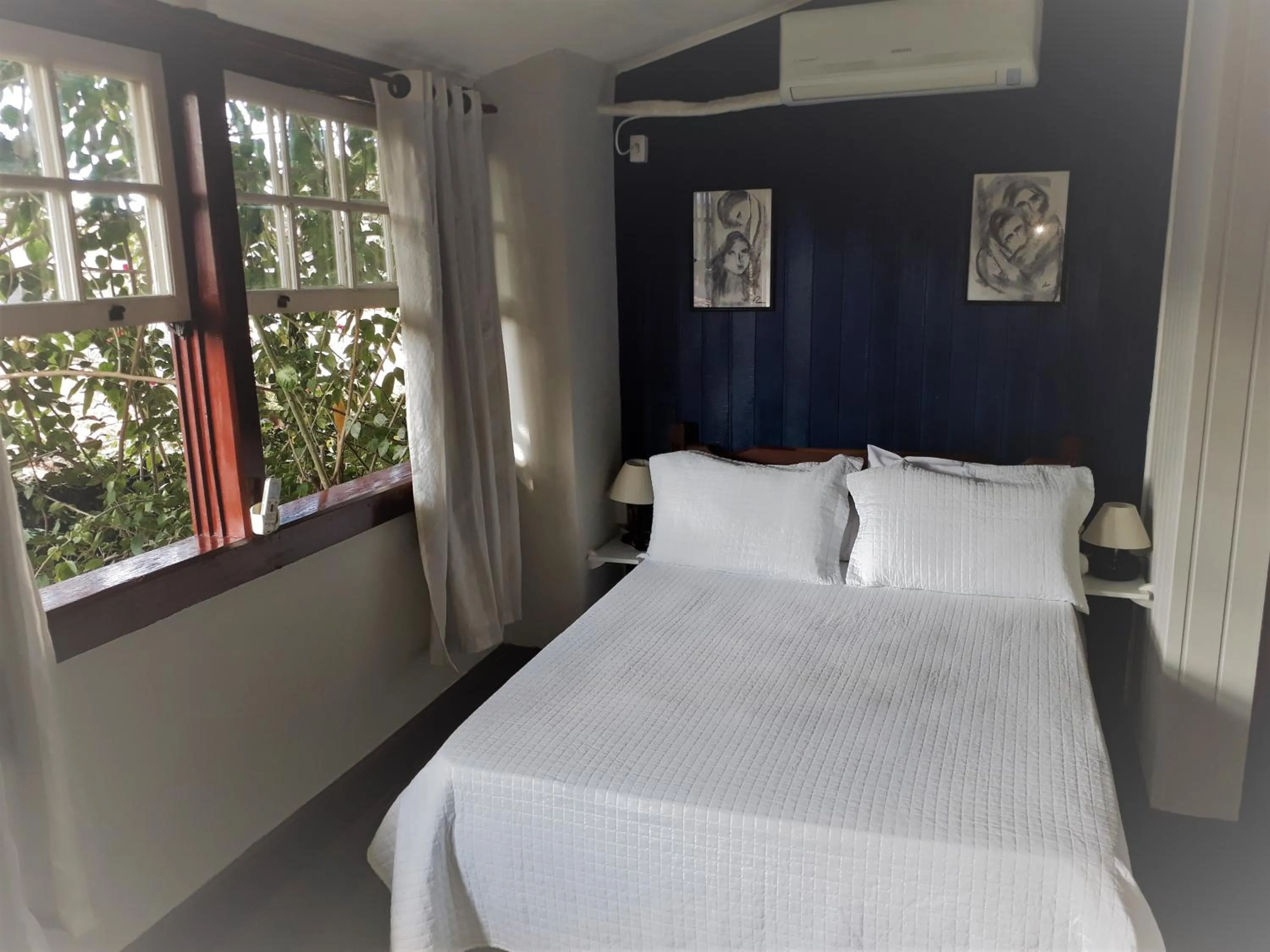 Bed in Pousada Arte Colonial - Casarão Histórico do Séc XVIII - Lancha Própria