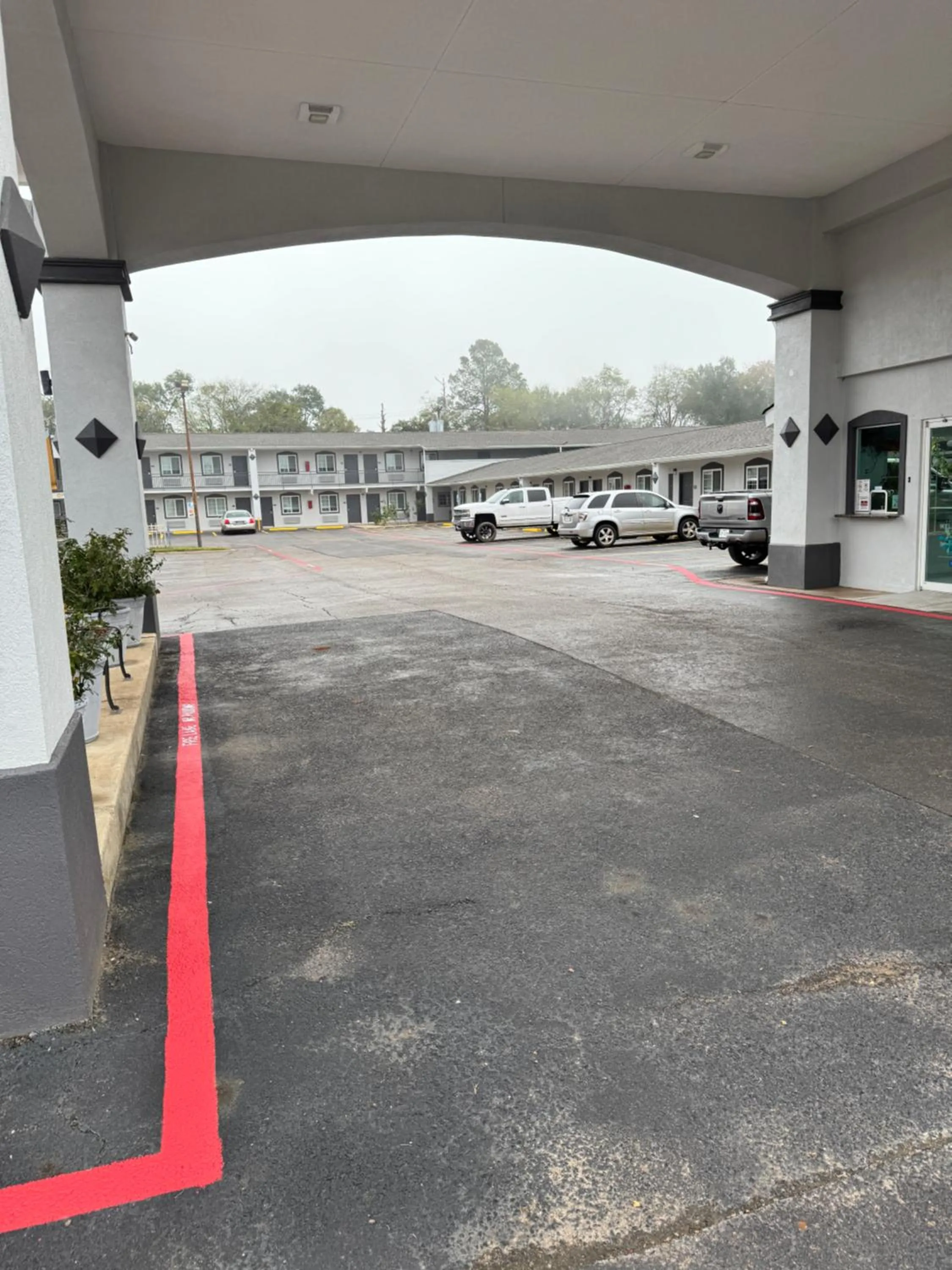 Property building in Continental Inn and Suites Nacogdoches TX SFA University Downtown