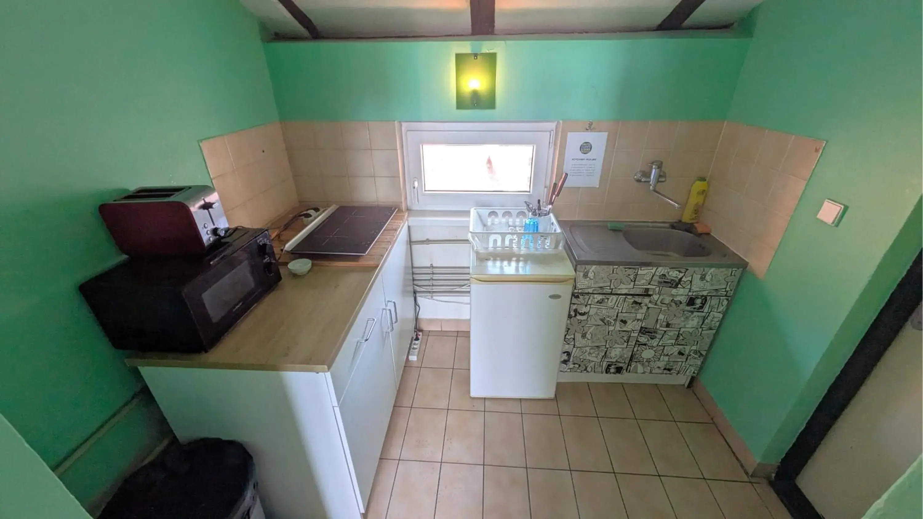 Quadruple Room with Private Bathroom in Clown and Bard Hostel Quadruple Room with Private Bathroom in Clown and Bard Hostel