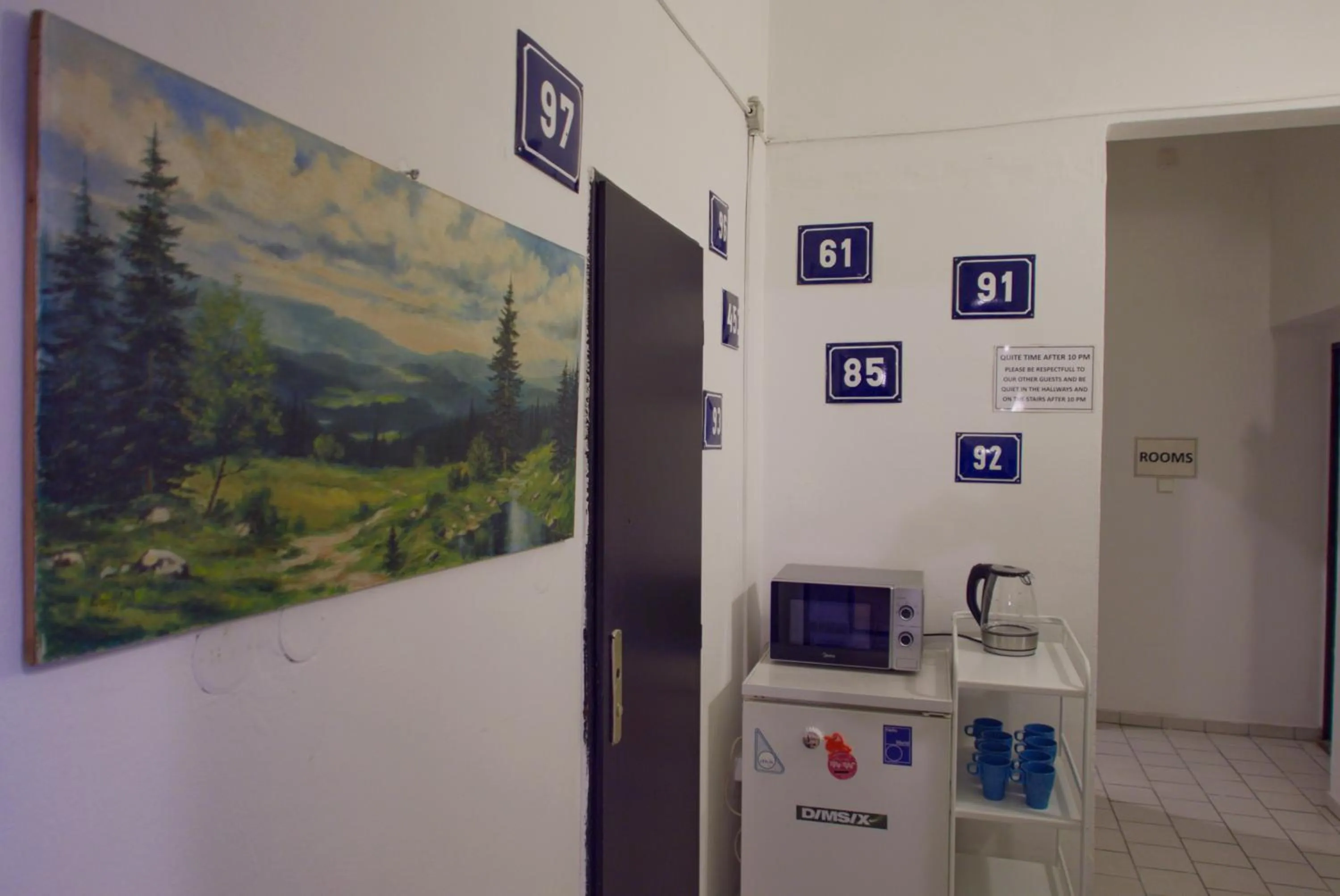 Communal kitchen in Clown and Bard Hostel