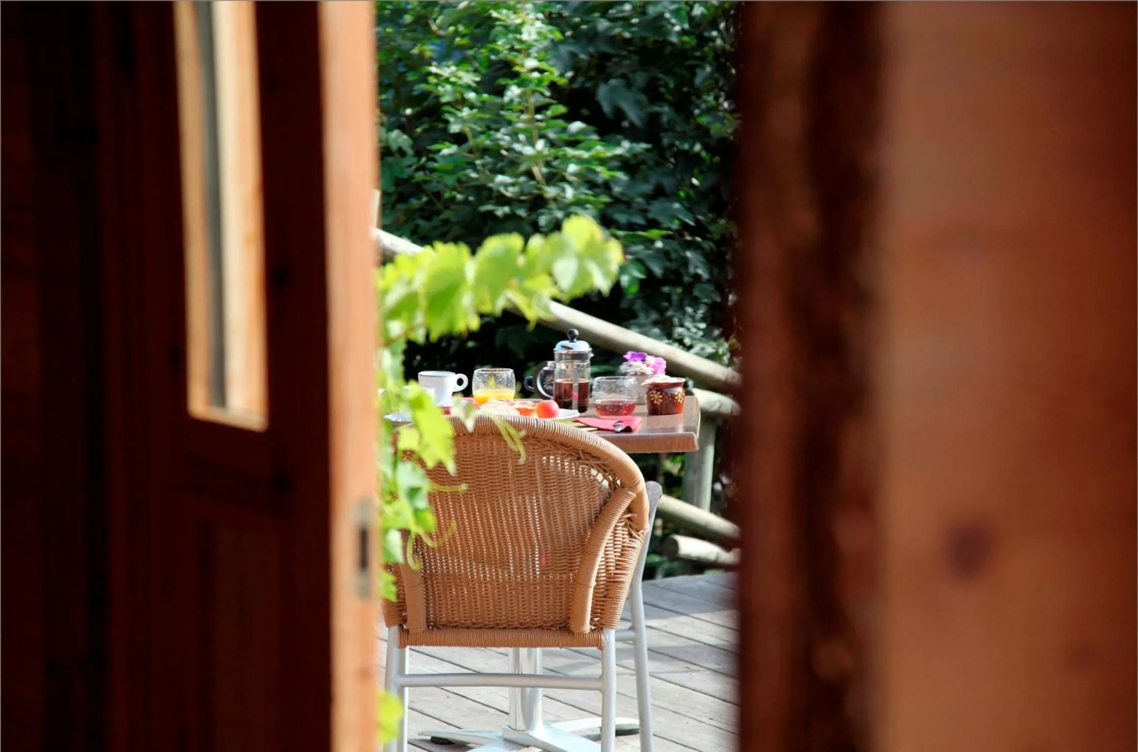 Seating area in Hôtel La Ferme du Chozal, Chalet de tradition