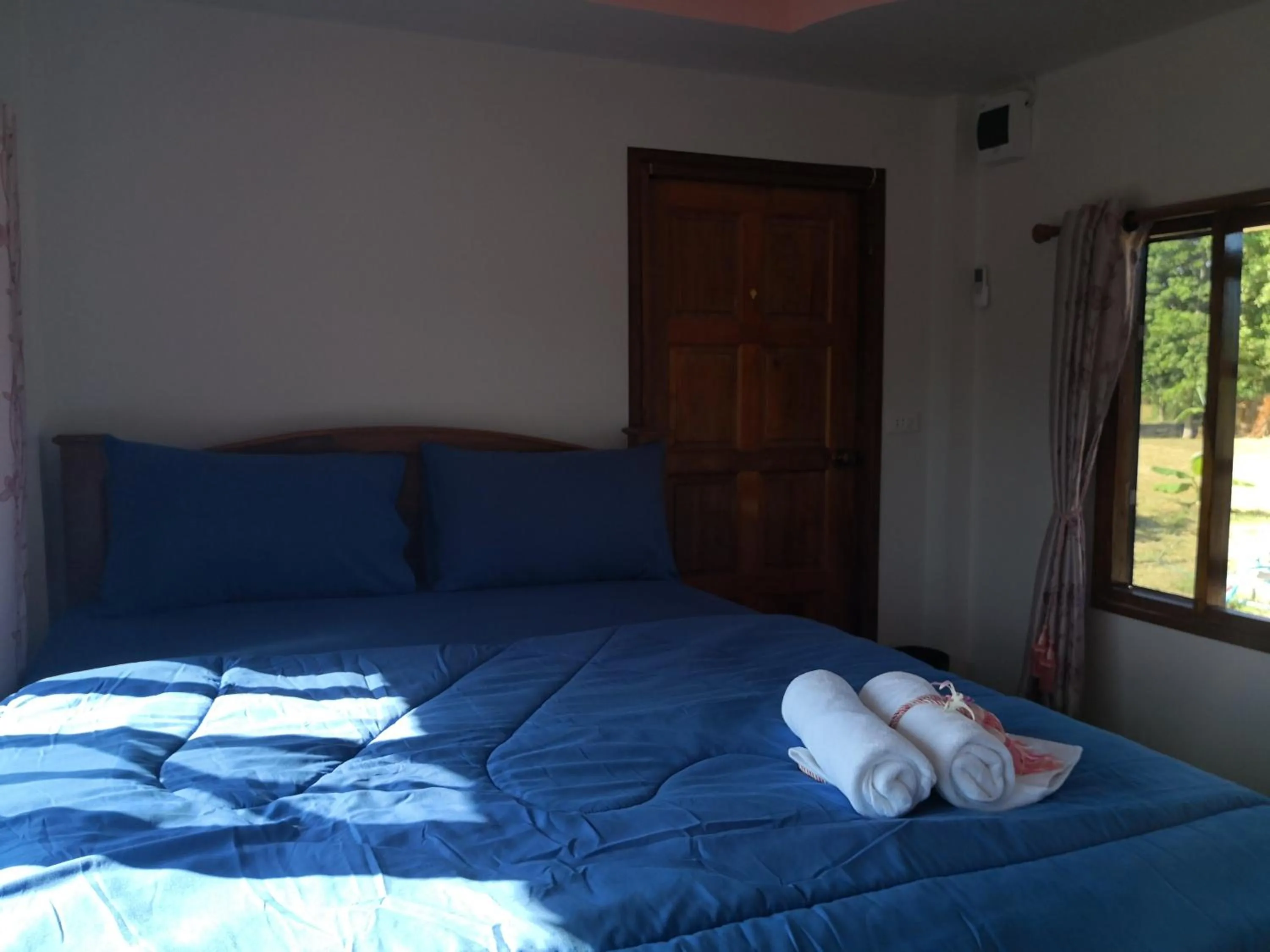 Bed in Pumaka Resort