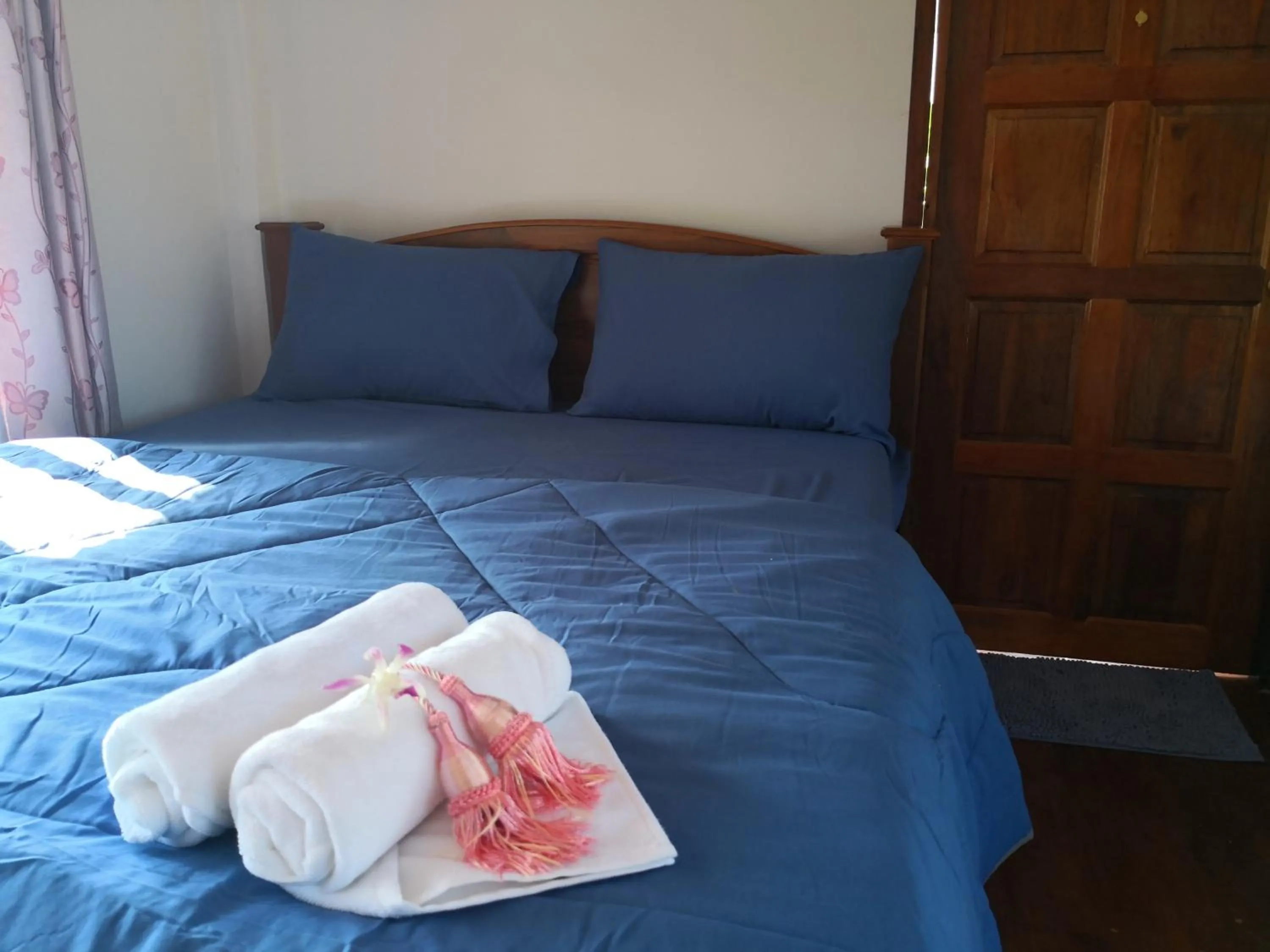 Bed in Pumaka Resort