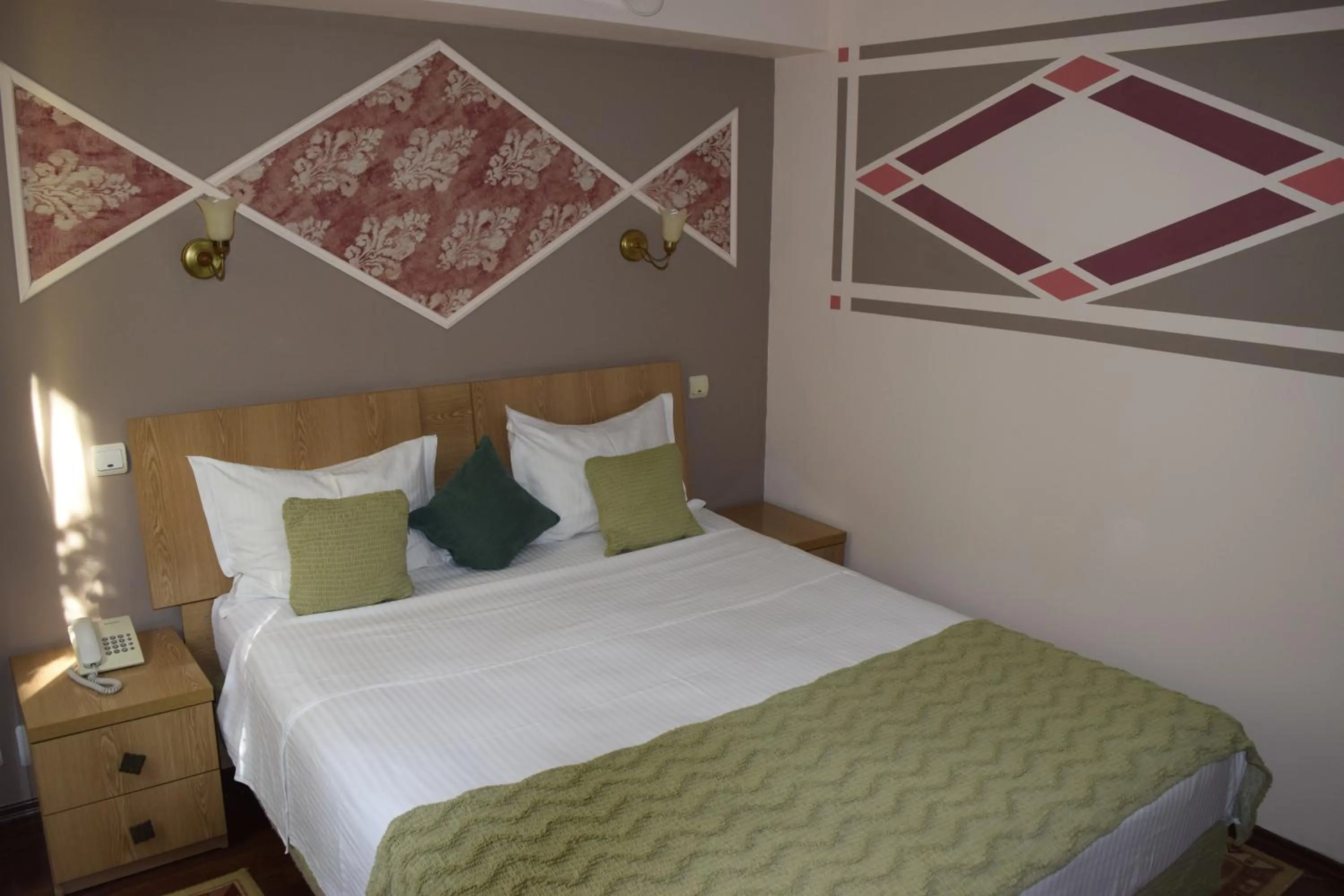 Bed in Hotel Michelangelo