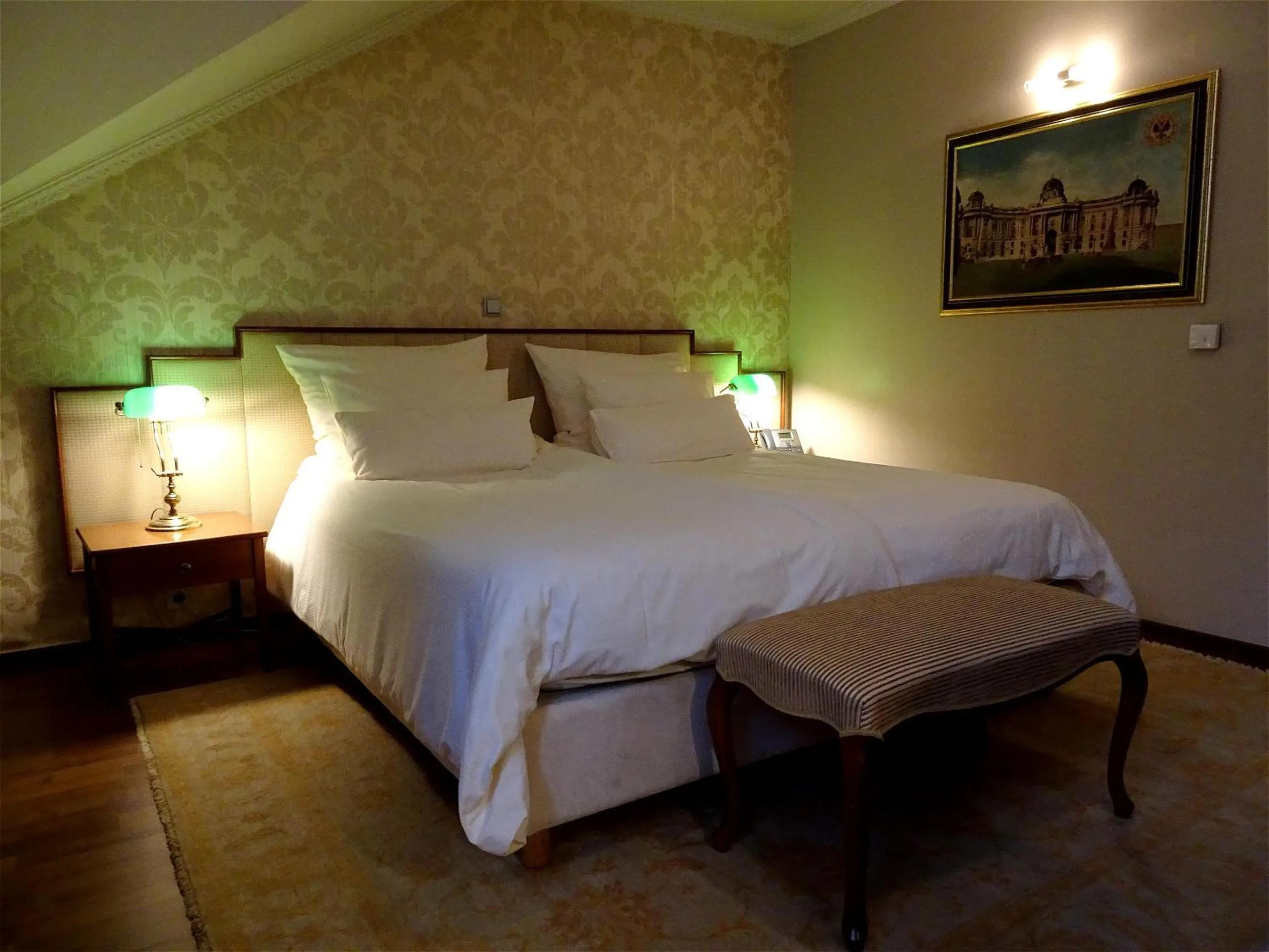 Bed in Hotel Mitra, Story Hotels