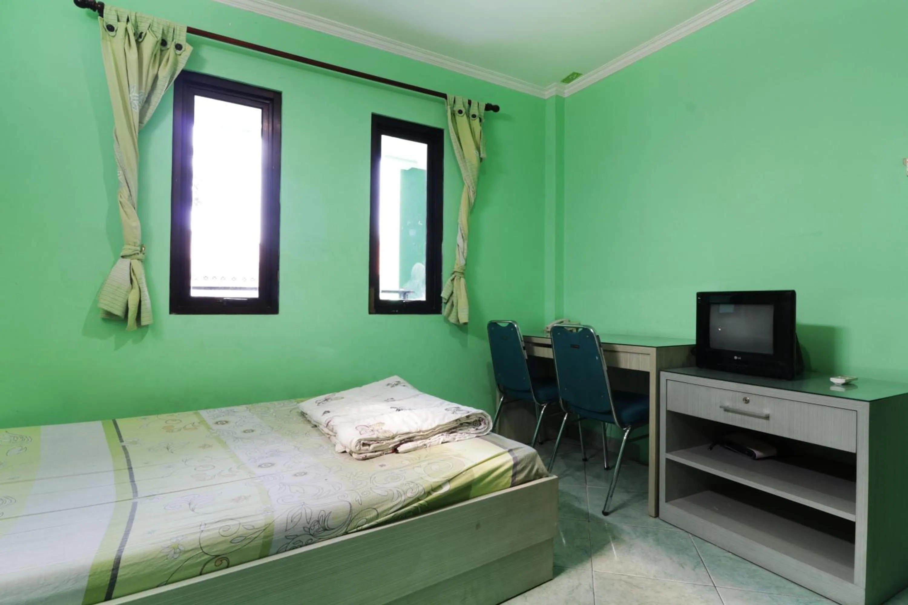 Photo of the whole room, Bed in Wisma Aam Syariah