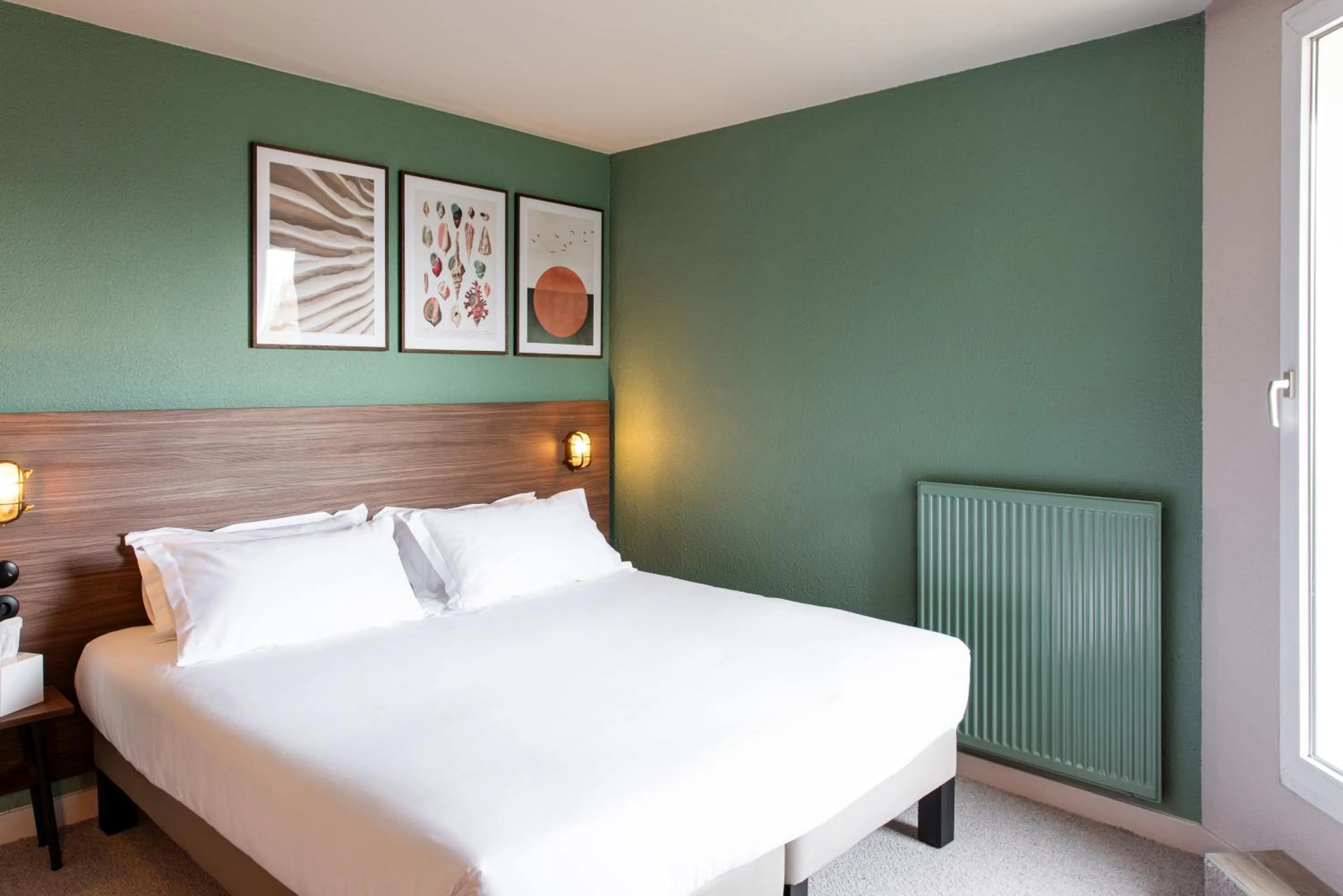 Bed in La Maison OBONO Hôtel & Spa