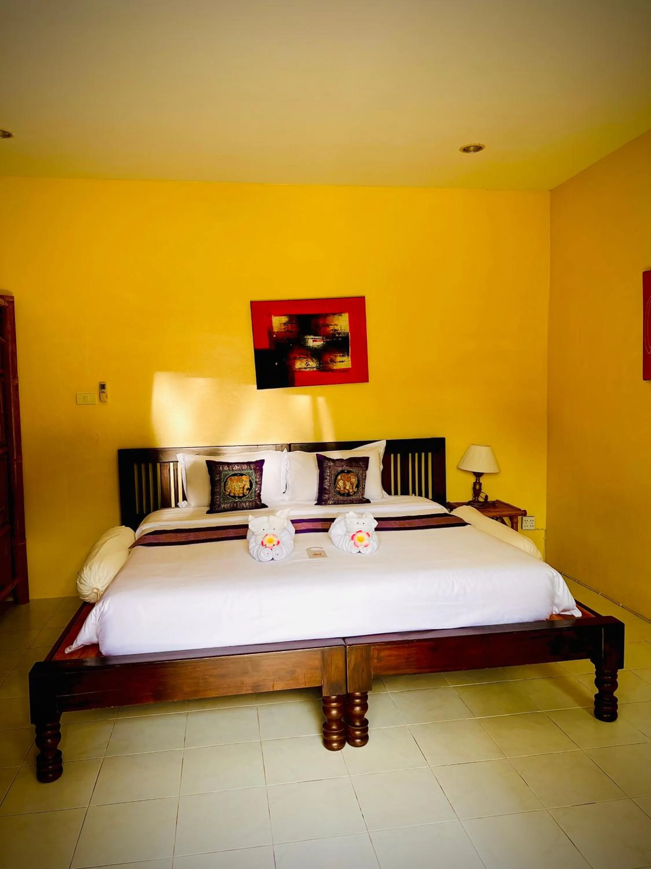 Bed in Baan Ton Rak Boutique Resort