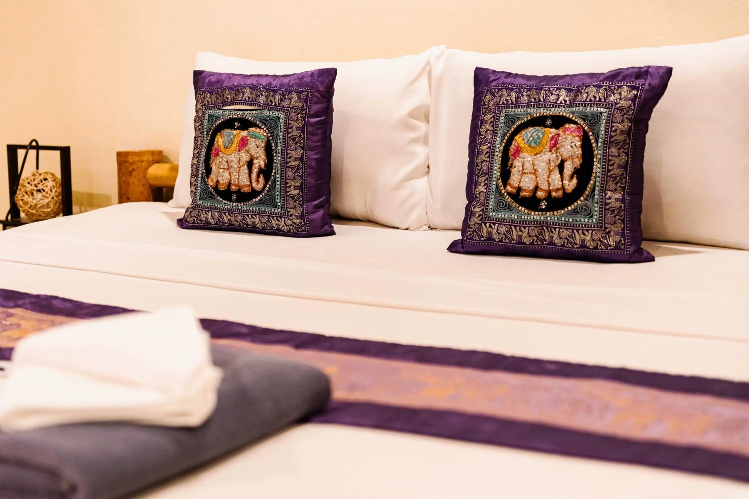 Bed in Baan Ton Rak Boutique Resort