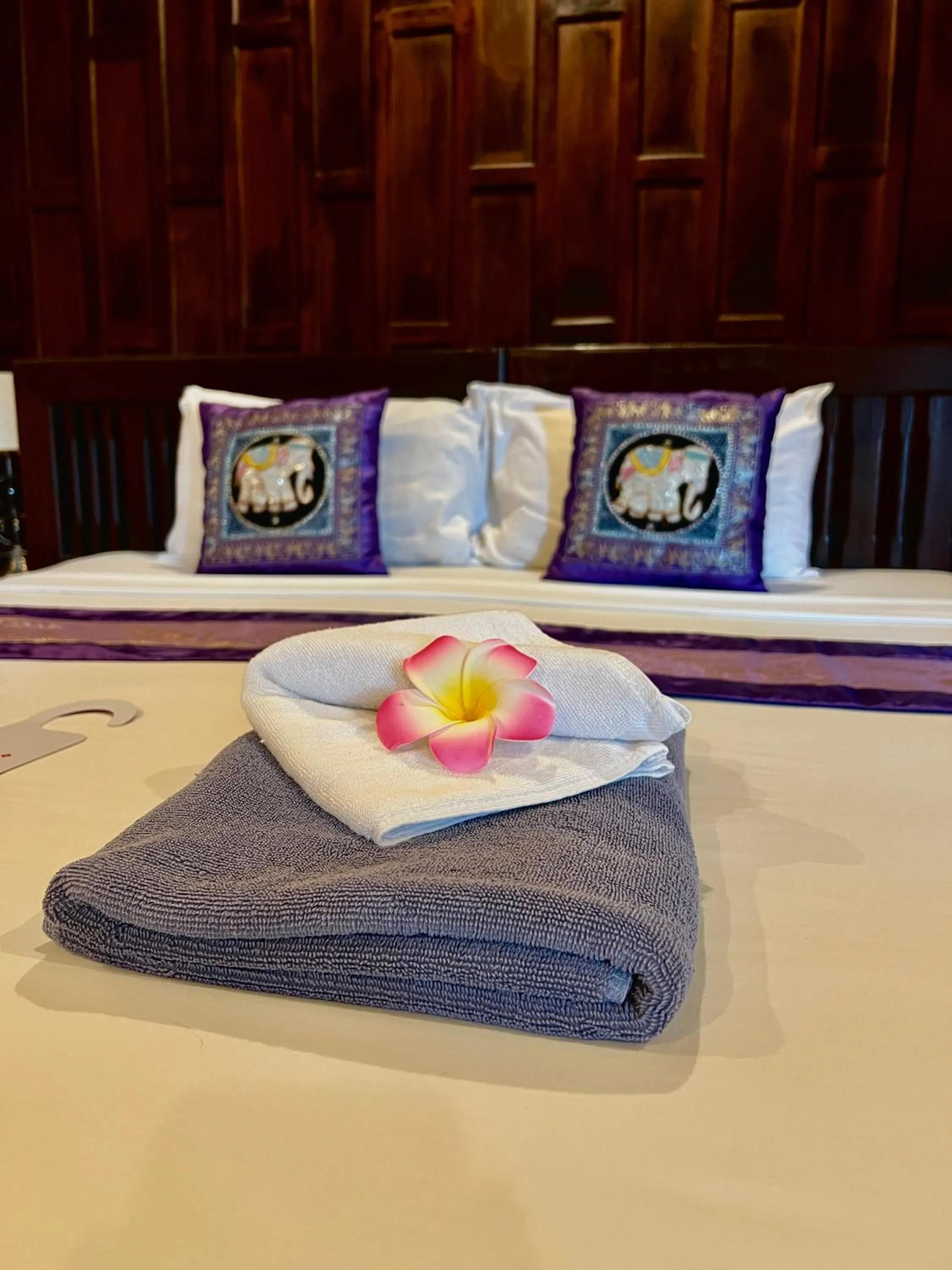 Bed in Baan Ton Rak Boutique Resort