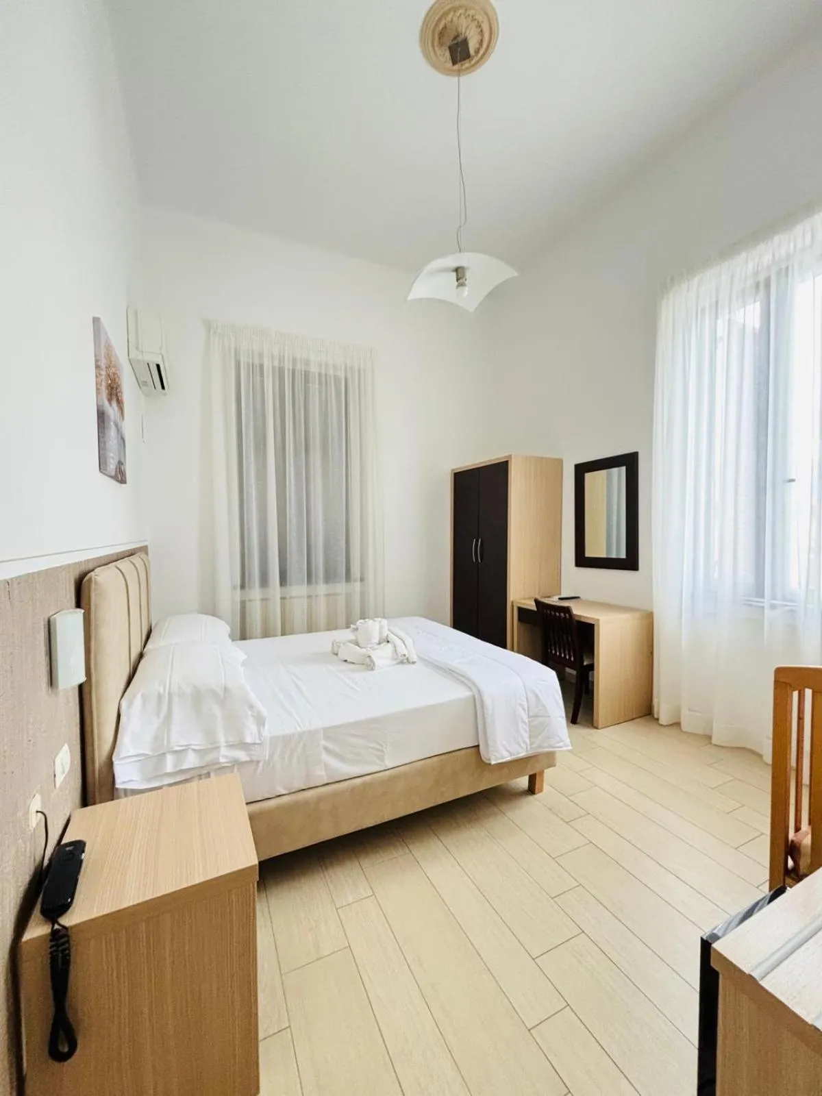 Bedroom in Hotel Virginia