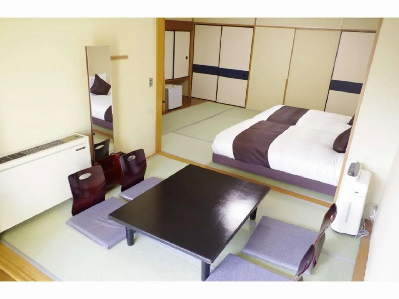 Bed in LiVEMAX RESORT Kawaji