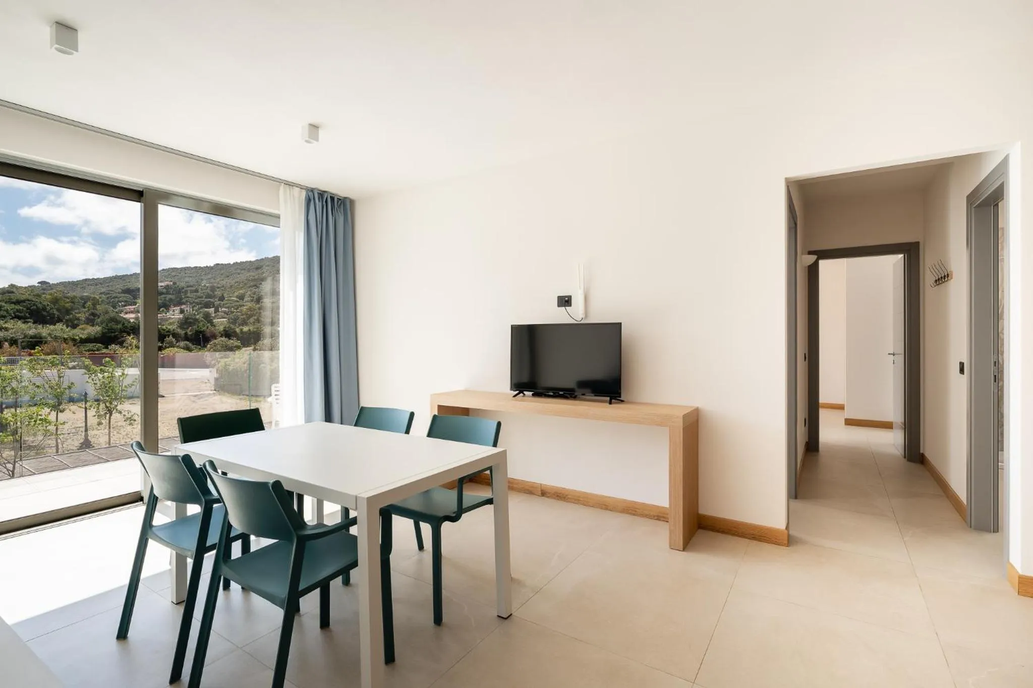 Communal lounge/ TV room in Hotel Delfino