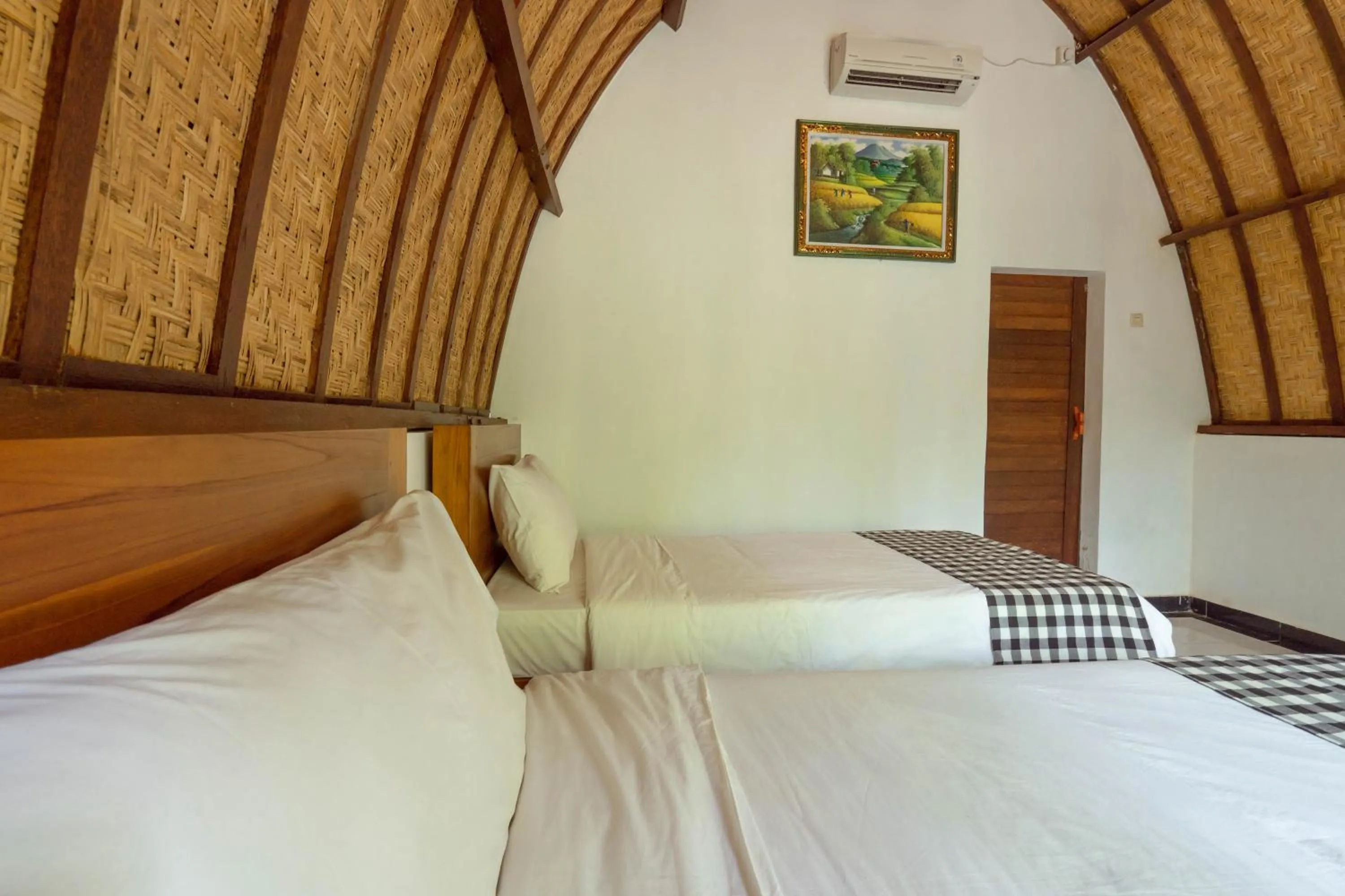 Bedroom, Bed in Ratu Cottage by OurStory Travels