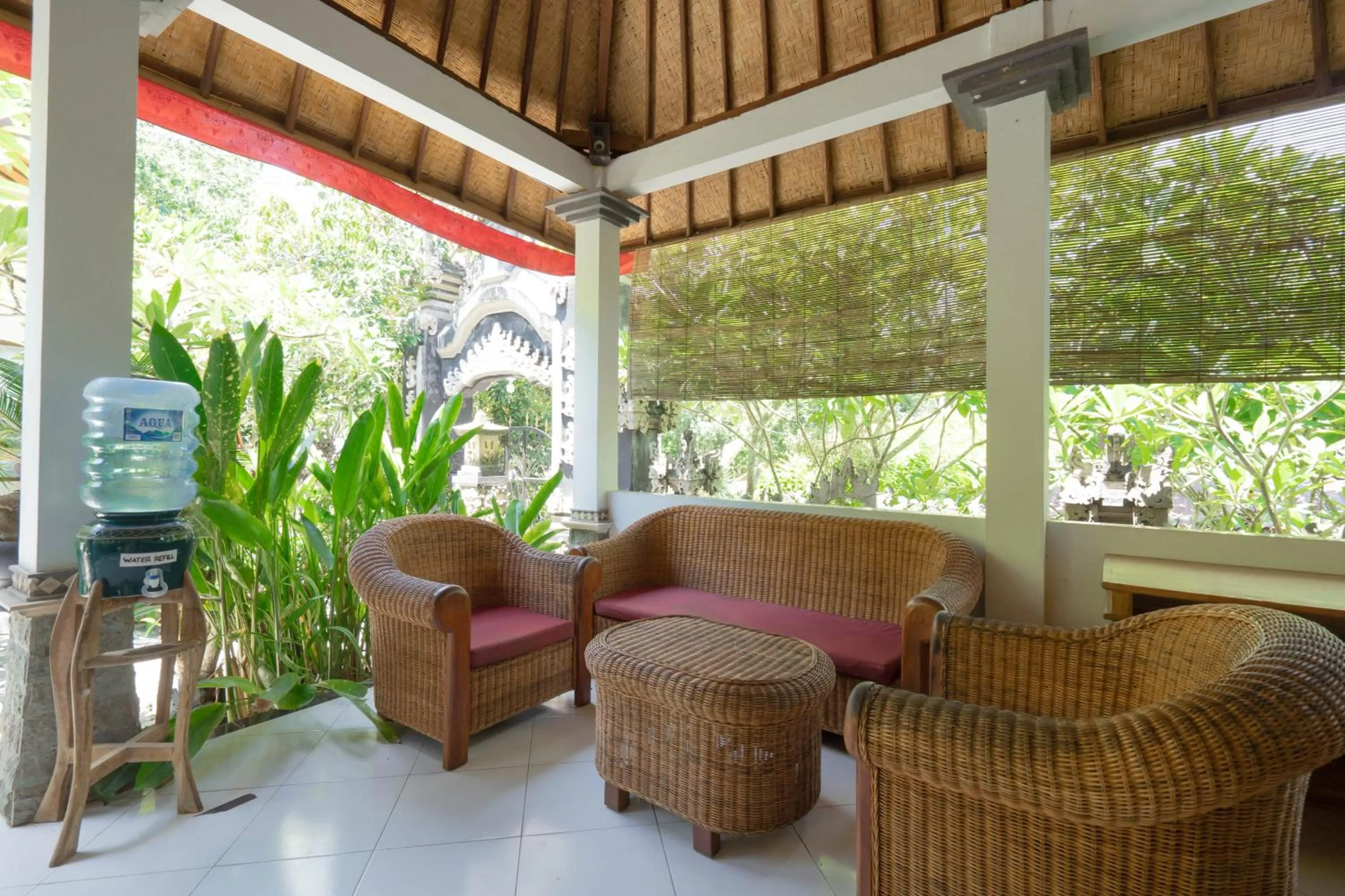 Seating area in Ratu Cottage by OurStory Travels