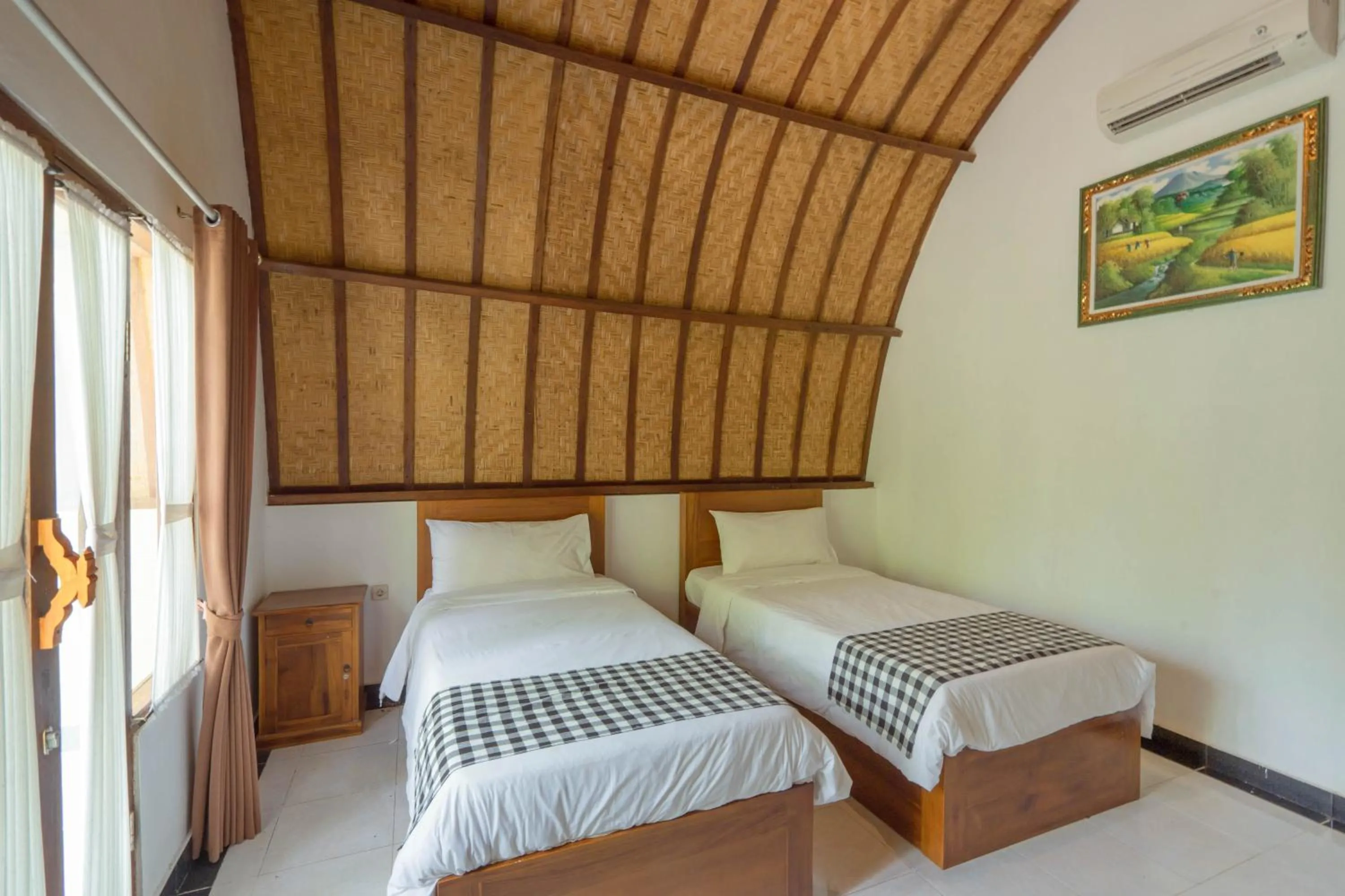 Bedroom, Bed in Ratu Cottage by OurStory Travels