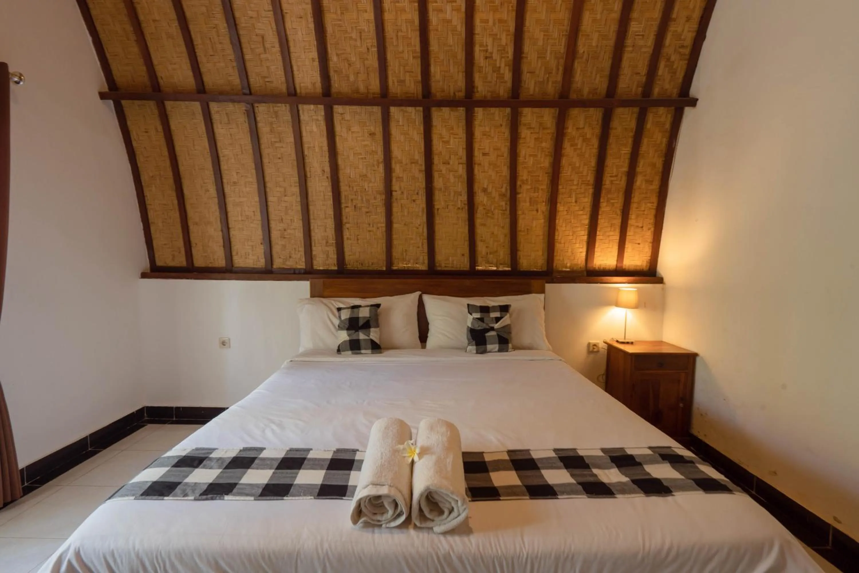 Bedroom, Bed in Ratu Cottage by OurStory Travels
