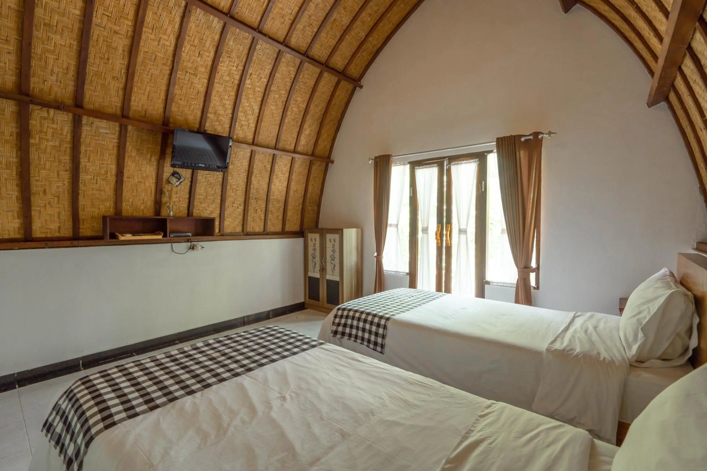Bedroom, Bed in Ratu Cottage by OurStory Travels
