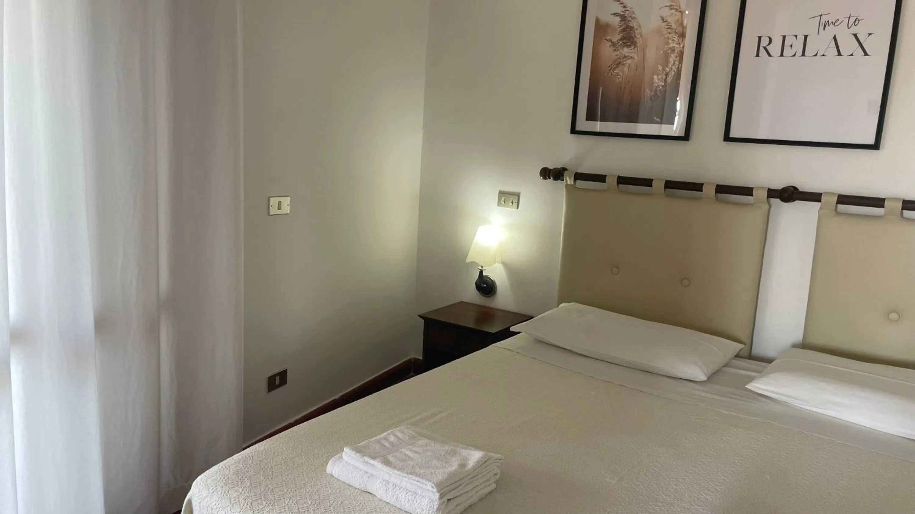 Photo of the whole room, Bed in Casa Ulisse