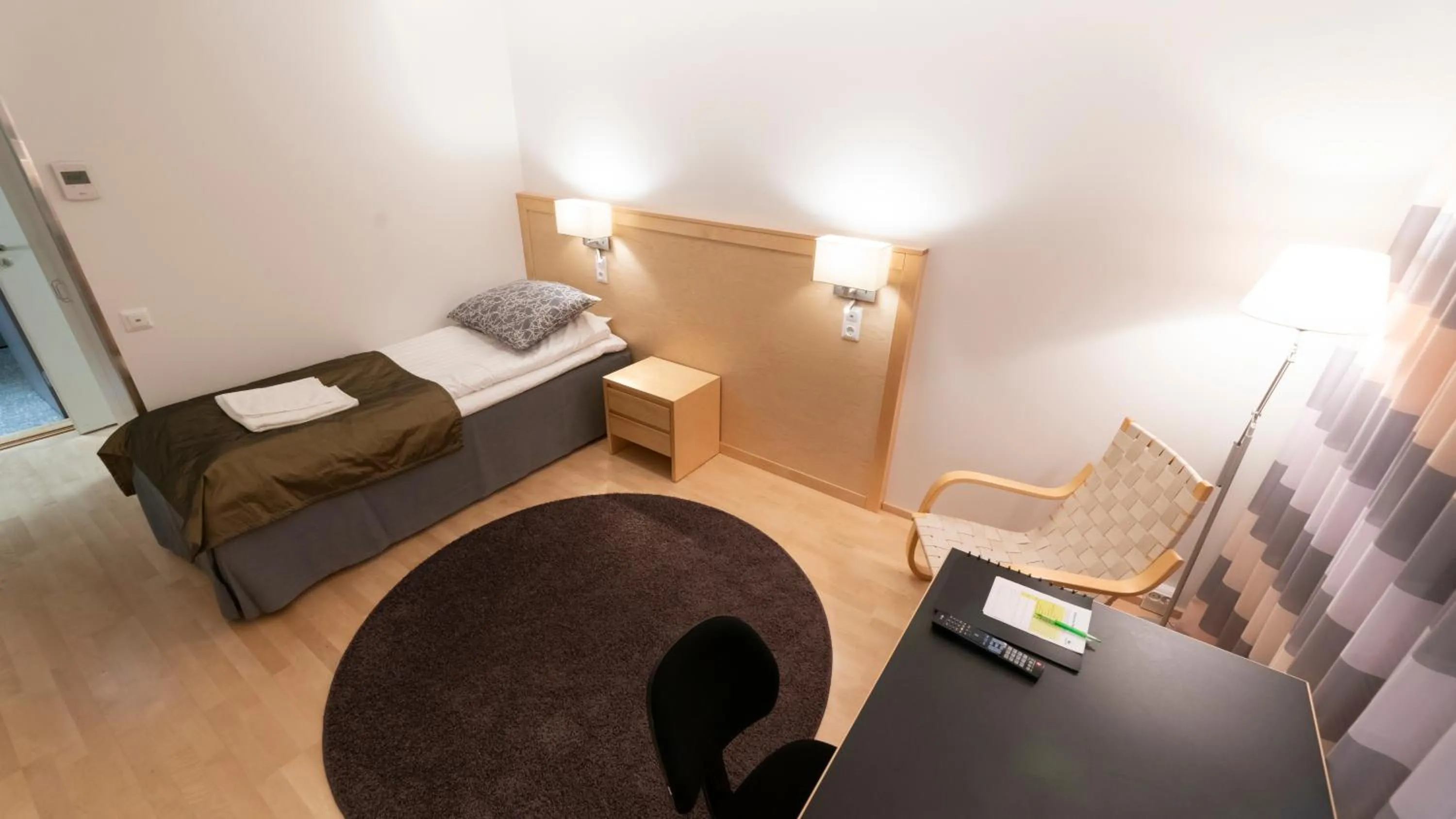 Bed in Kokoushotelli Murikanranta