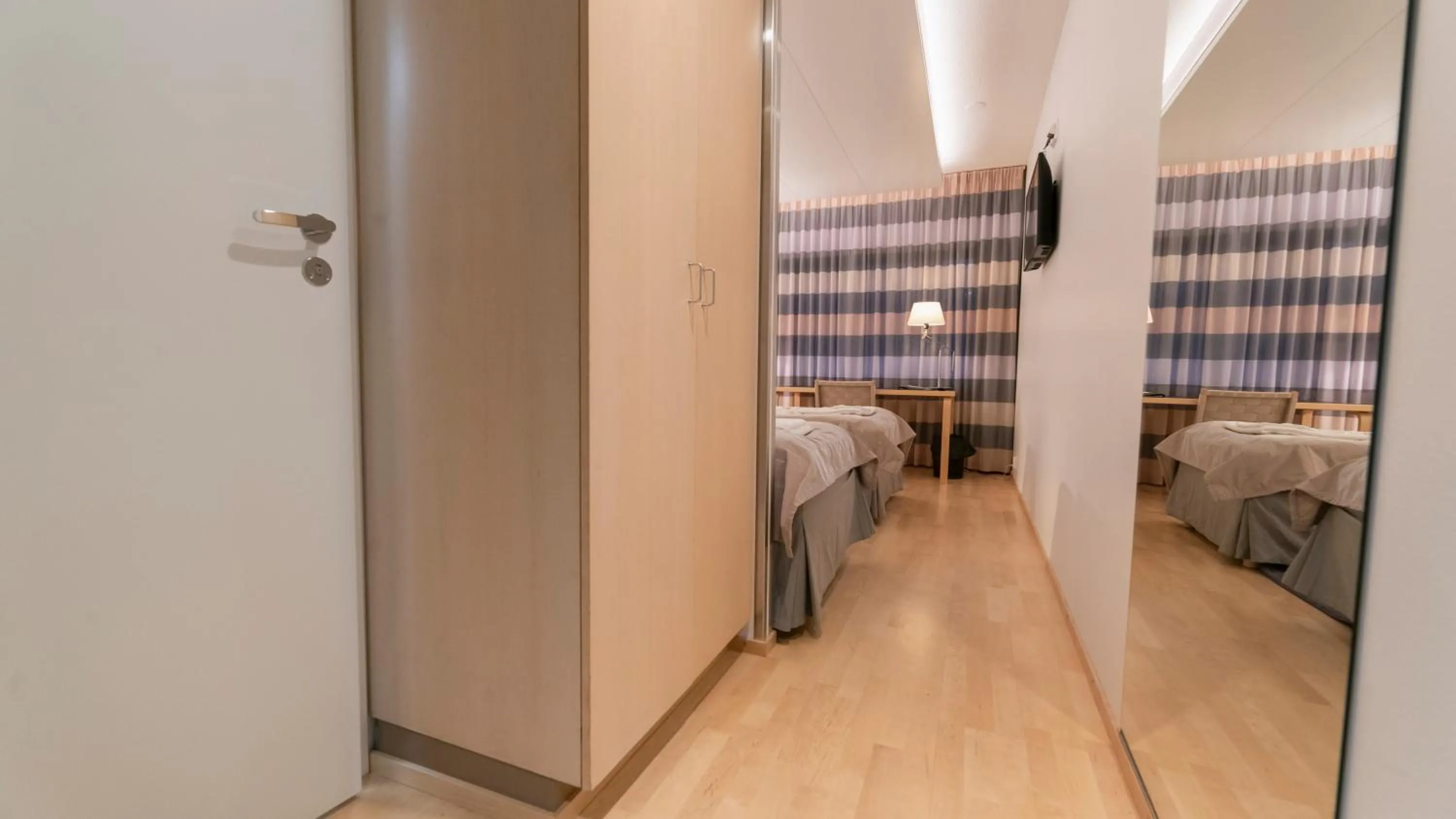 Bed in Kokoushotelli Murikanranta